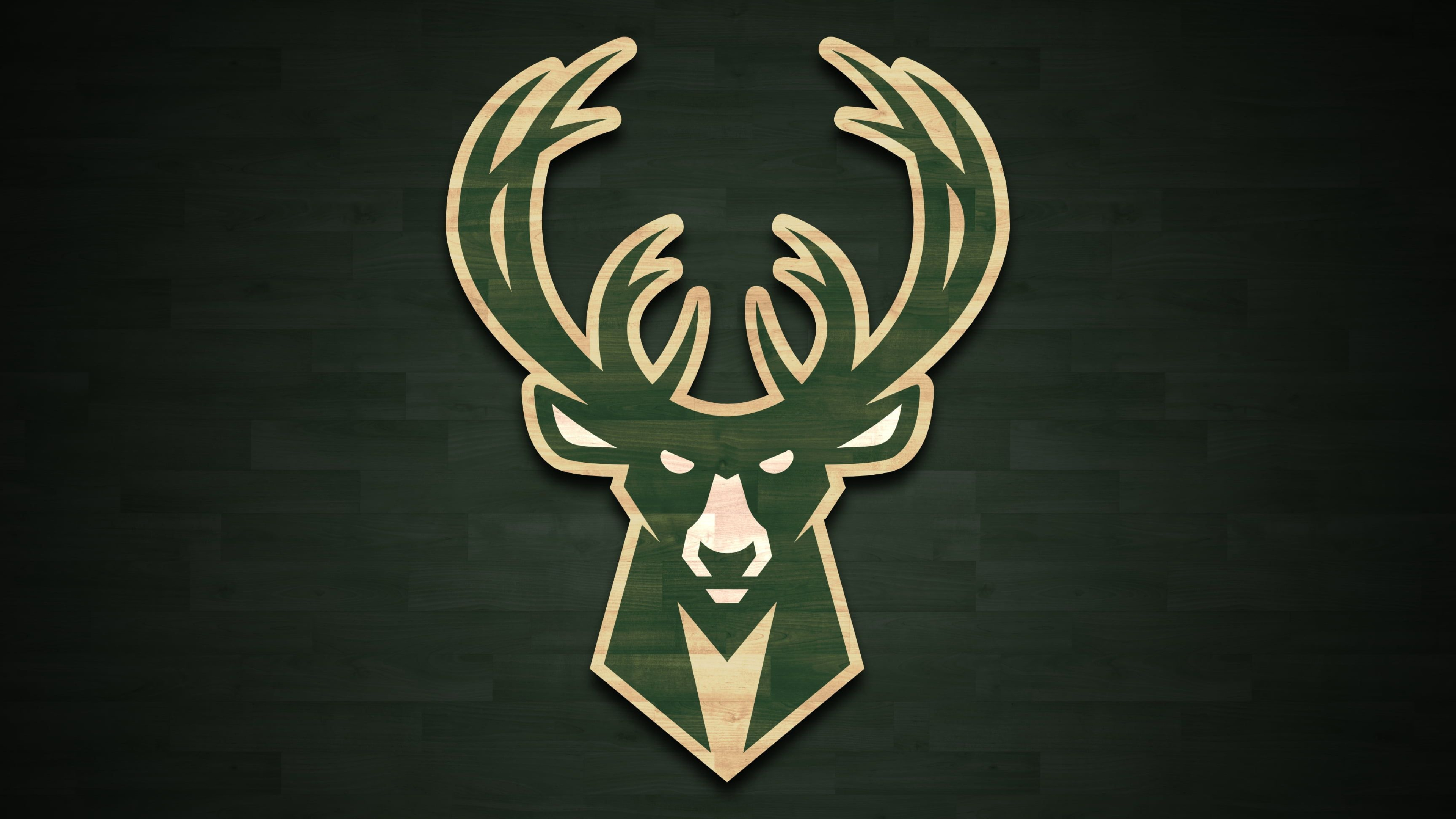Milwaukee Bucks deer head logo, Cream antlers on green, Dark green hardwood backdrop, 4K Desktop wallpaper