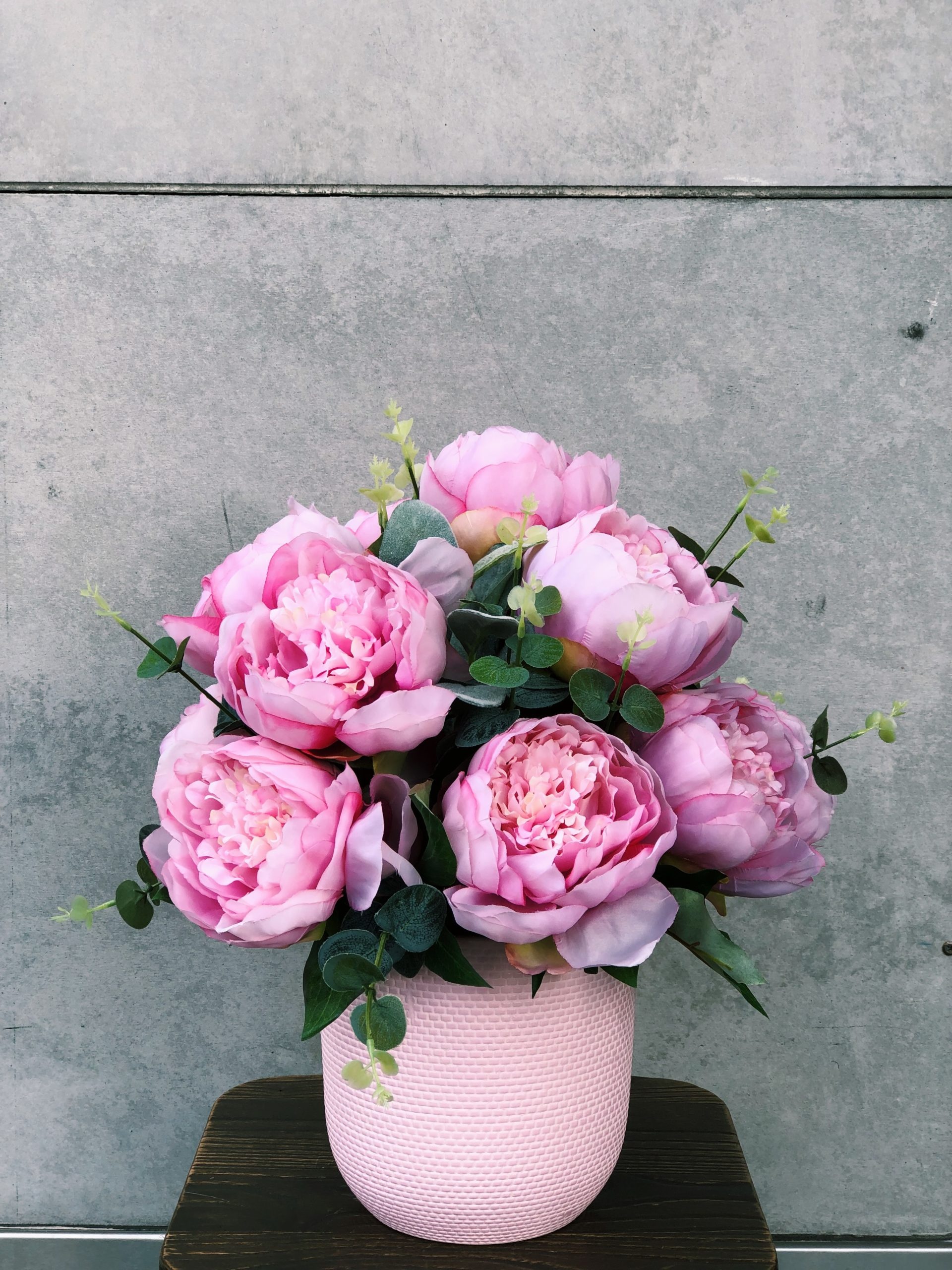 Pink peony arrangement, Textured pink ceramic pot, Eucalyptus sprigs, Grey concrete wall, HD Phone wallpaper