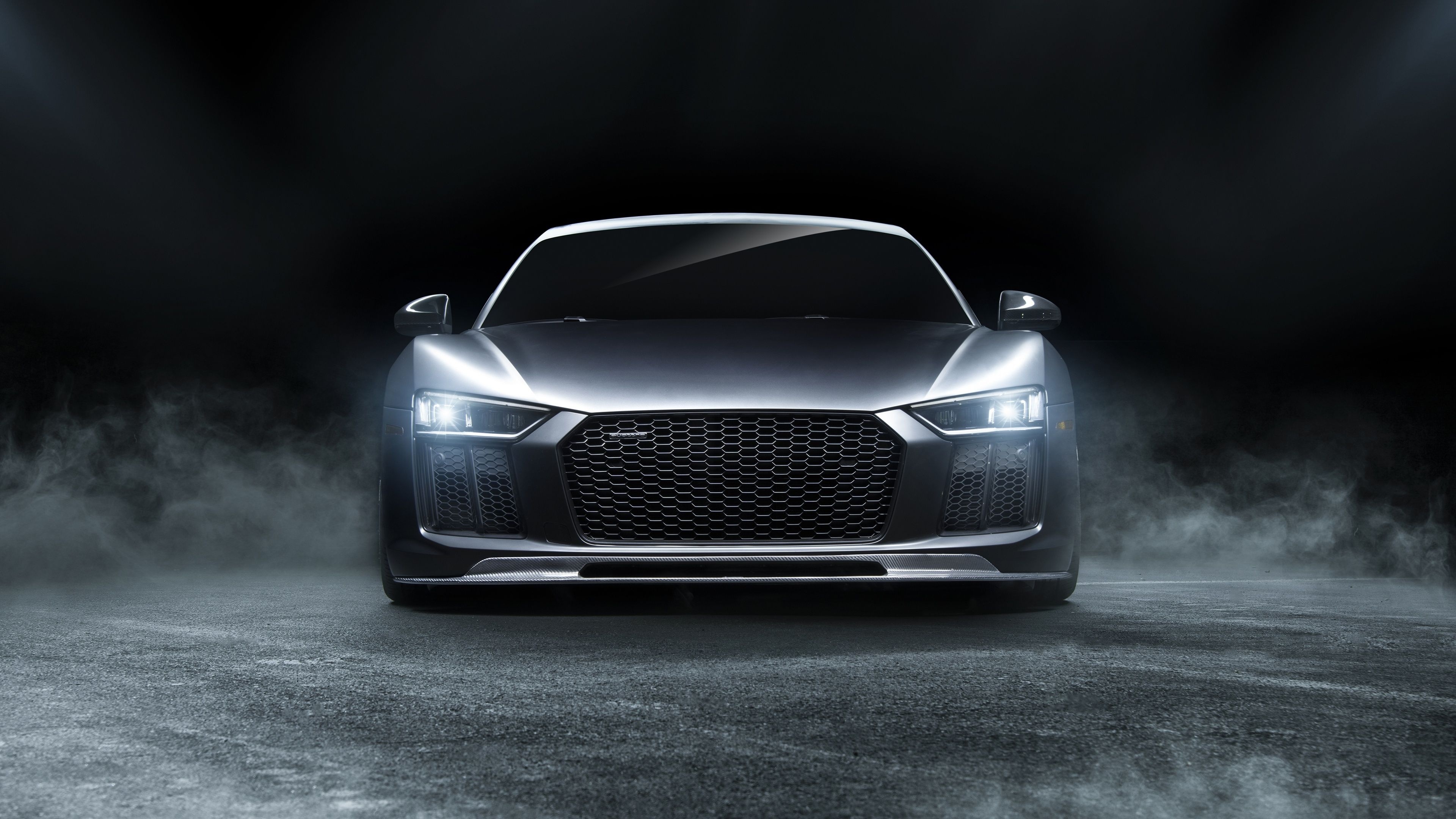 Audi R8 V10 Coupe, glowing LED headlights, smoky dark studio, 4K Desktop wallpaper