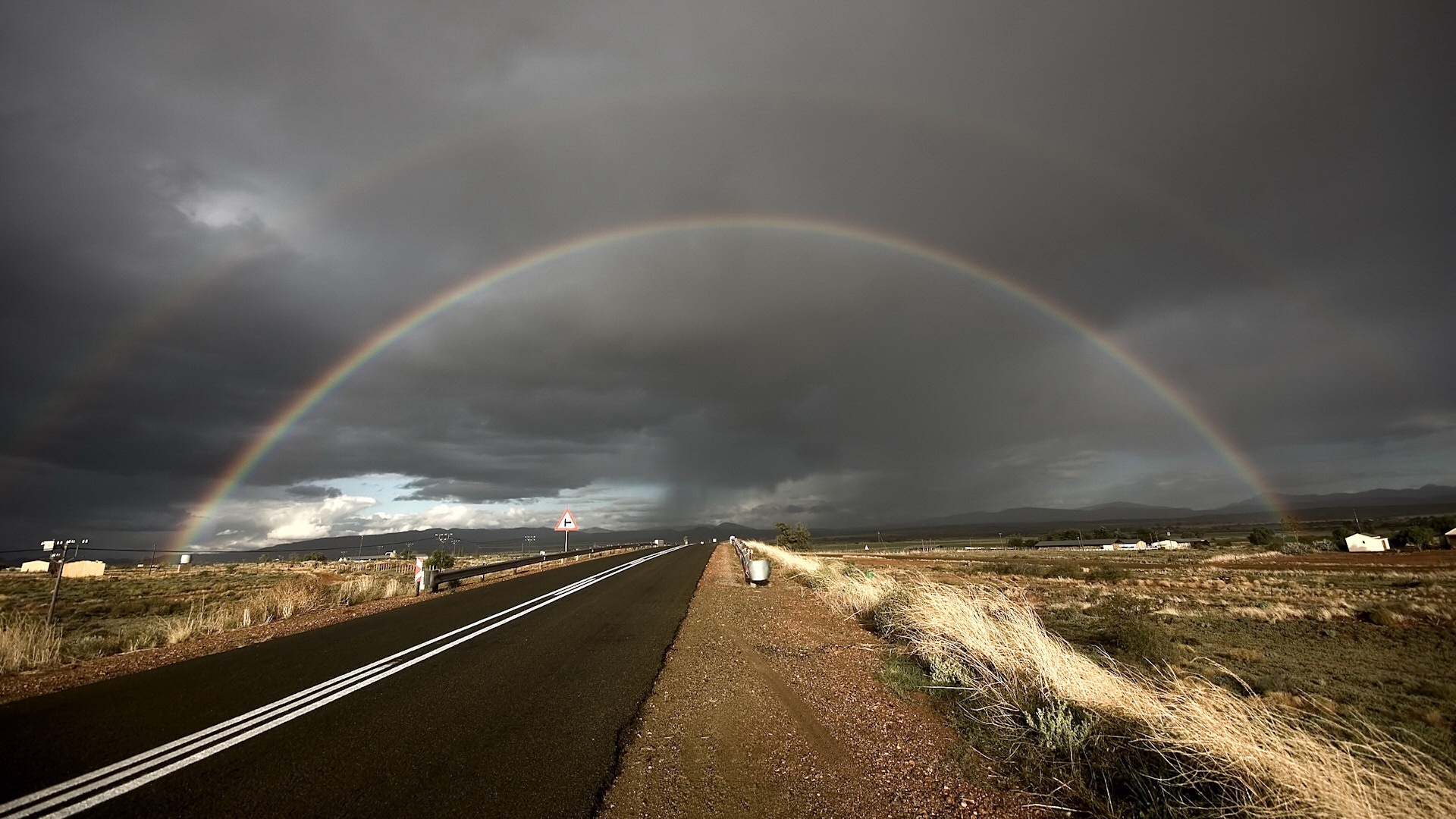 Double rainbow arc, Asphalt highway road, Dark storm clouds, Full HD Desktop wallpaper