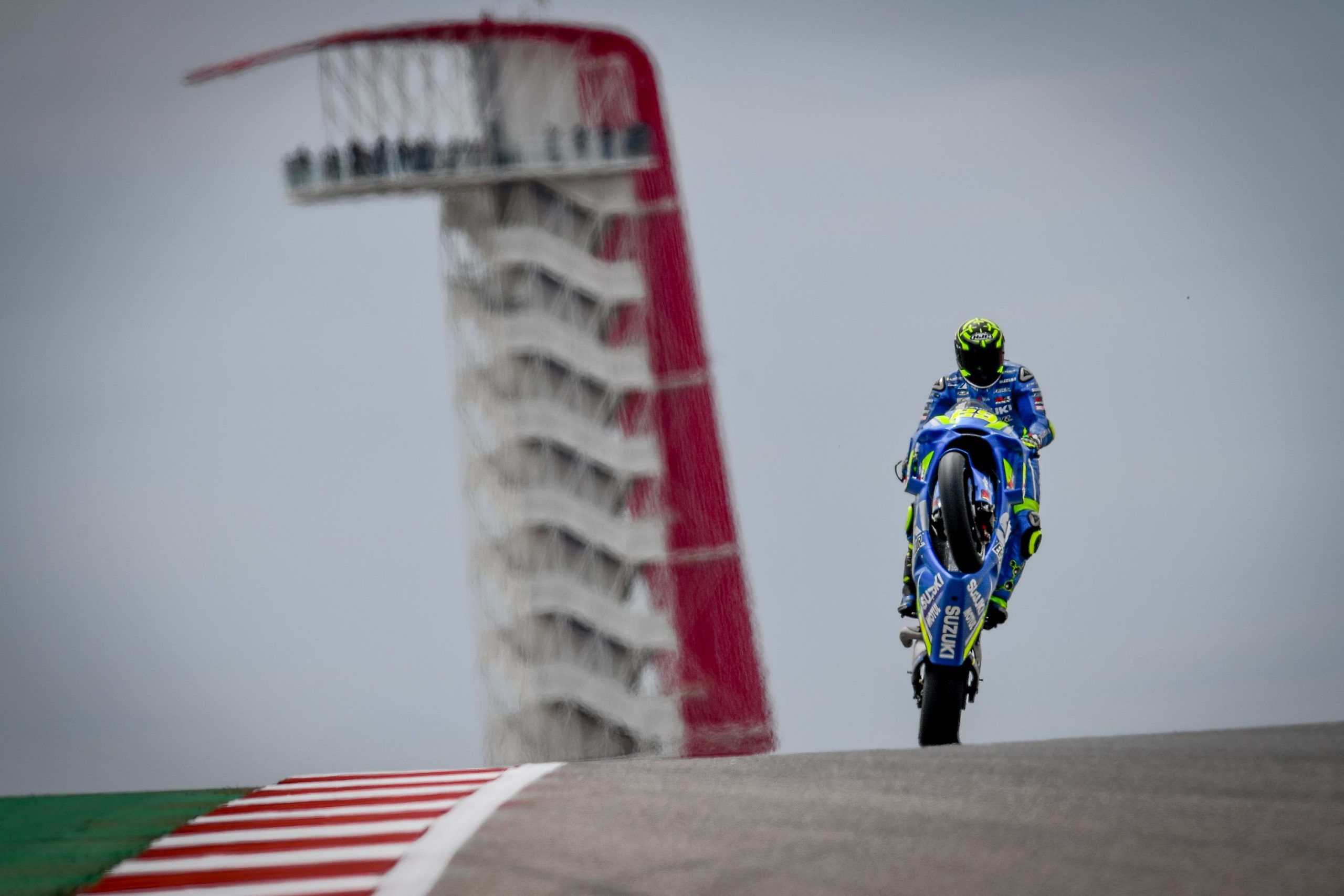 Circuit of the Americas observation tower, Suzuki Ecstar GSX-RR wheelie, MotoGP crest over kerb, HD Desktop wallpaper