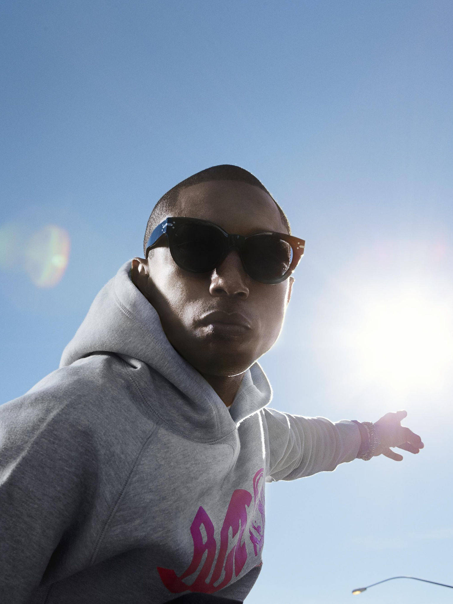 Pharrell Williams, Versatile talent, Vibrant images, Photo gallery, 1540x2050 HD Phone