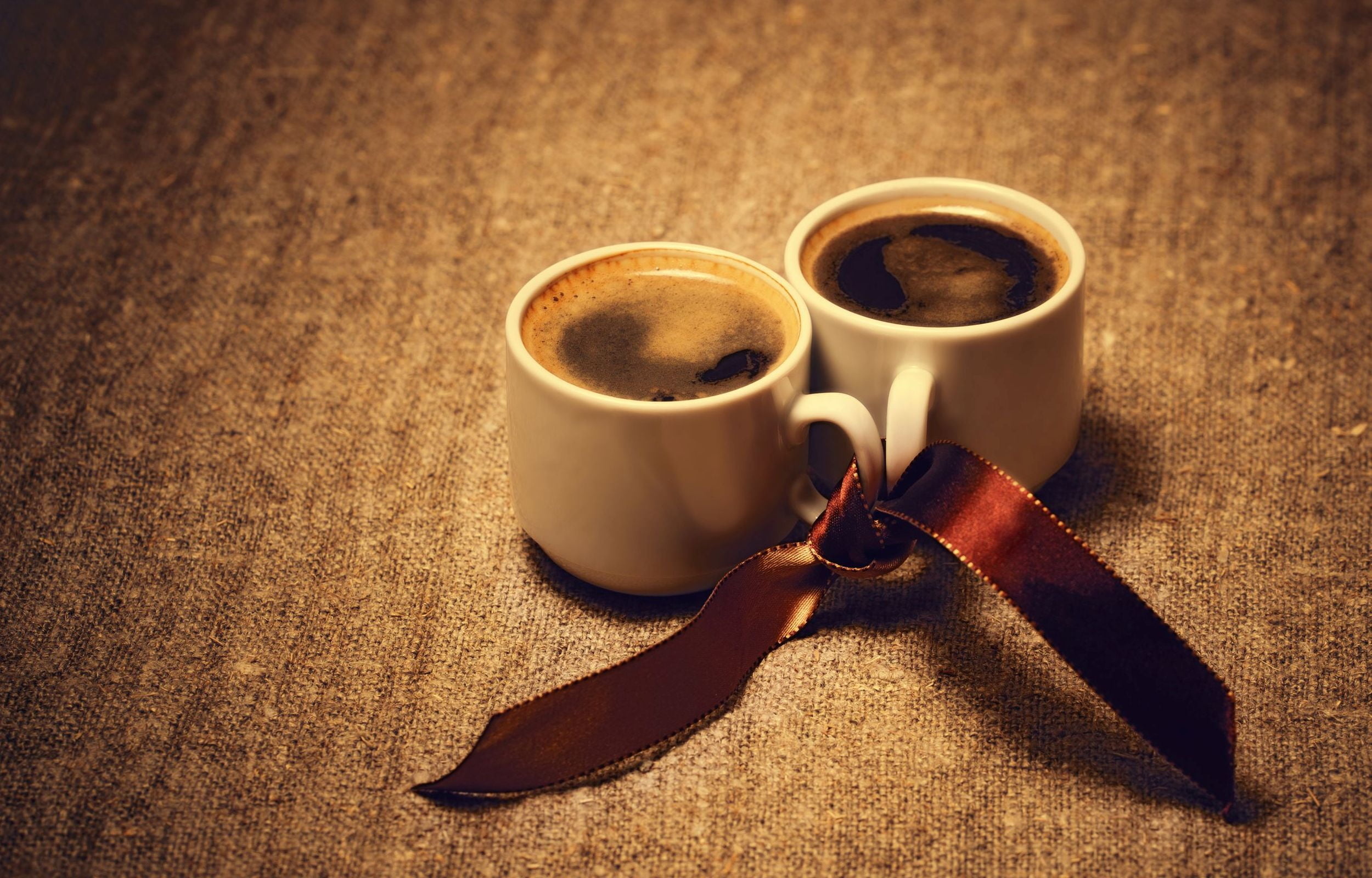 Two cups of coffee, Saucers, Wooden tabletop, 2500x1600 HD Desktop