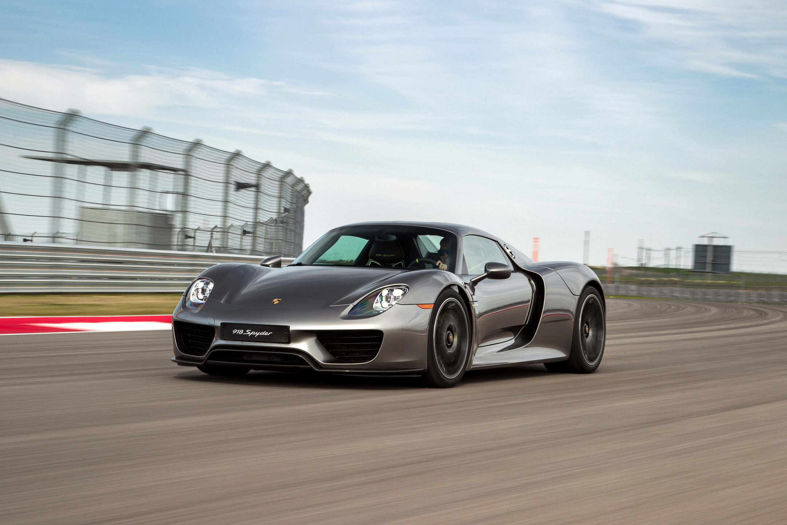 Porsche 918 Spyder, Racetrack catch fence, Red and white kerb, HD Desktop wallpaper
