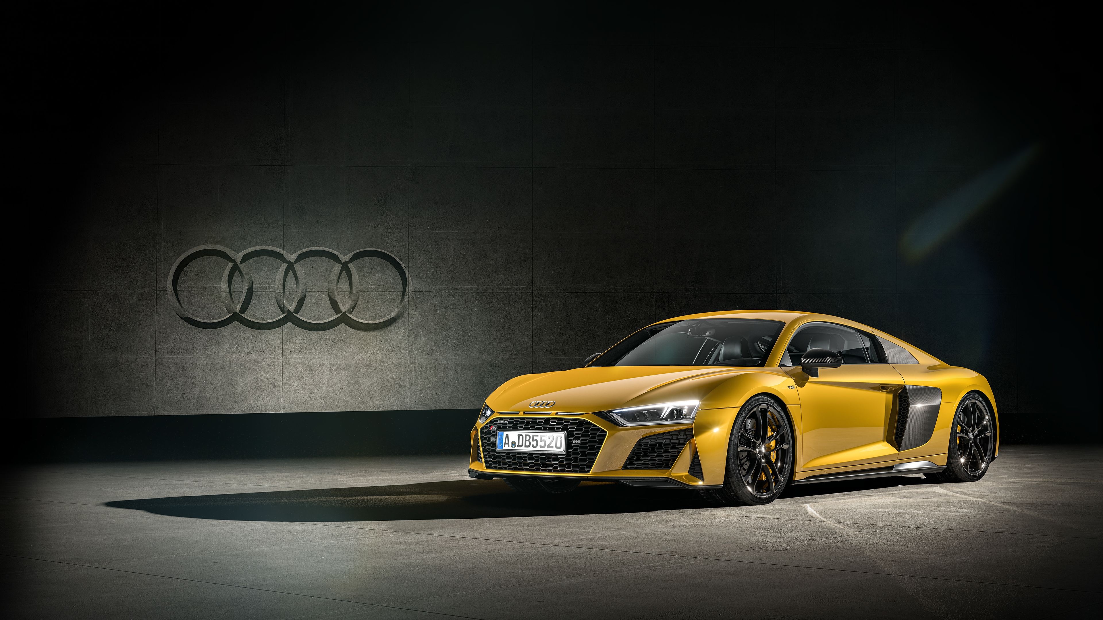 Audi R8 V10 performance, Audi four rings logo, dark studio lighting, 4K Desktop wallpaper