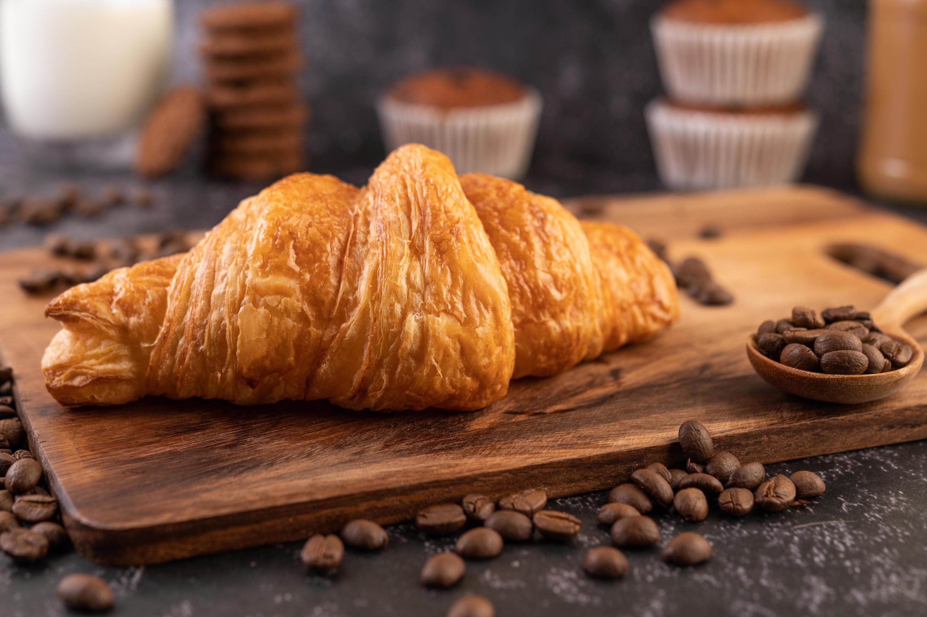 Croissant on wooden board, Coffee beans, Stock photo, Vecteezy, 2950x1960 HD Desktop