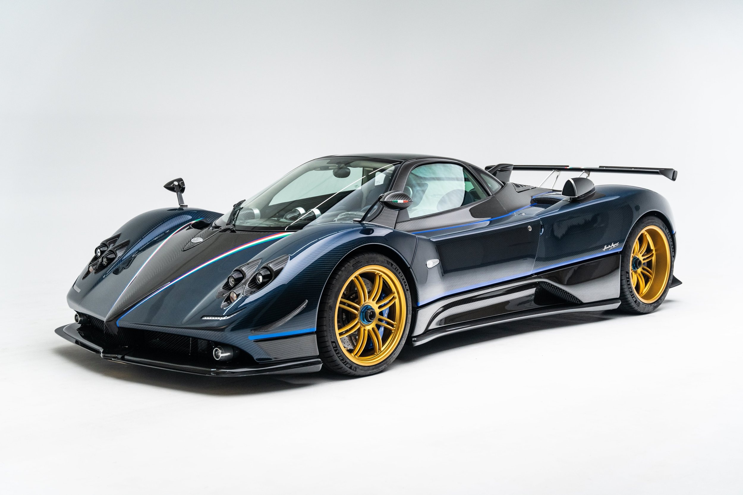 Pagani Zonda, blue tinted carbon fiber, gold alloy wheels, HD Desktop wallpaper