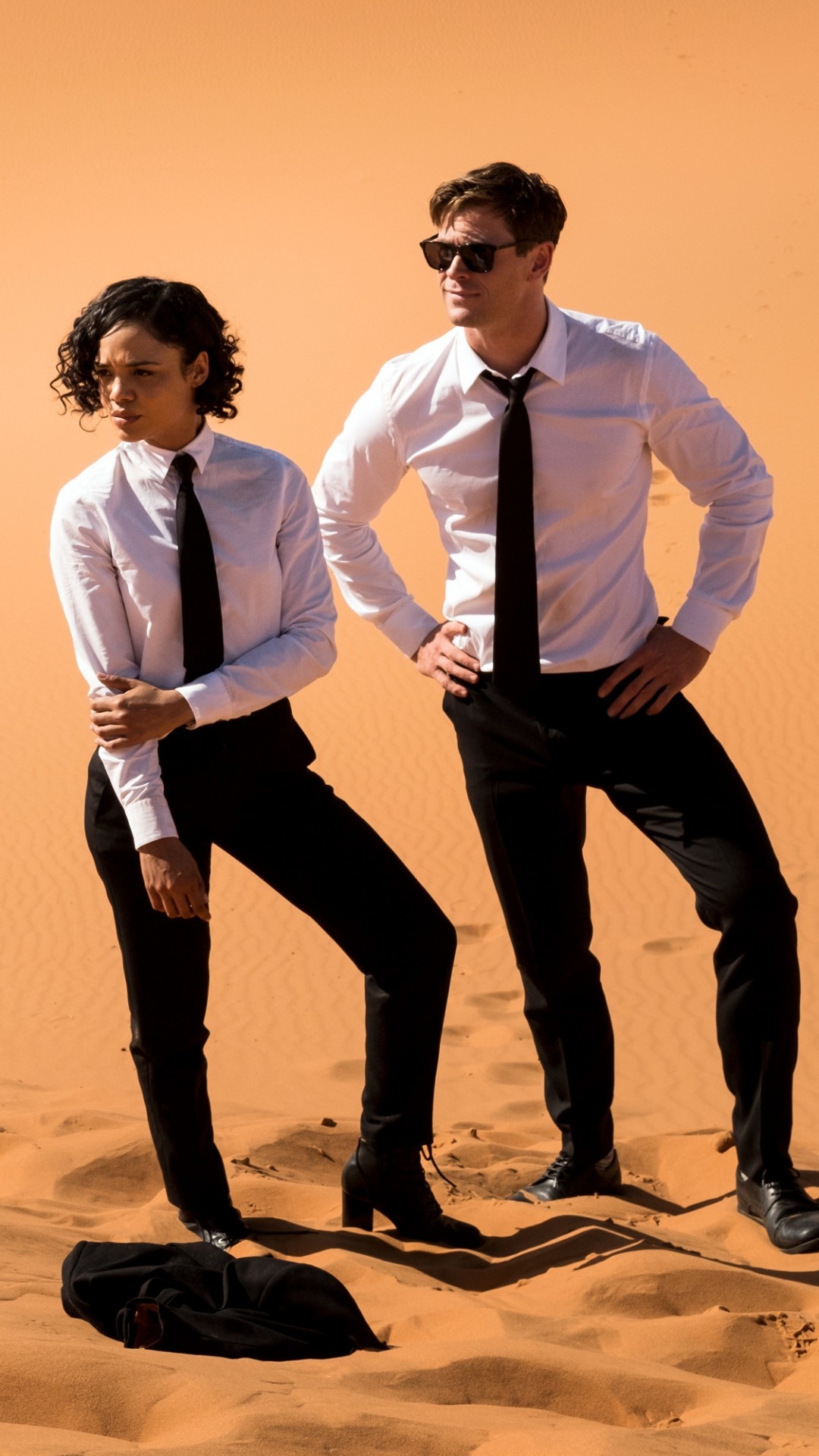 Chris Hemsworth, Tessa Thompson, 4K movie, Men in Black International, 1080x1920 Full HD Phone