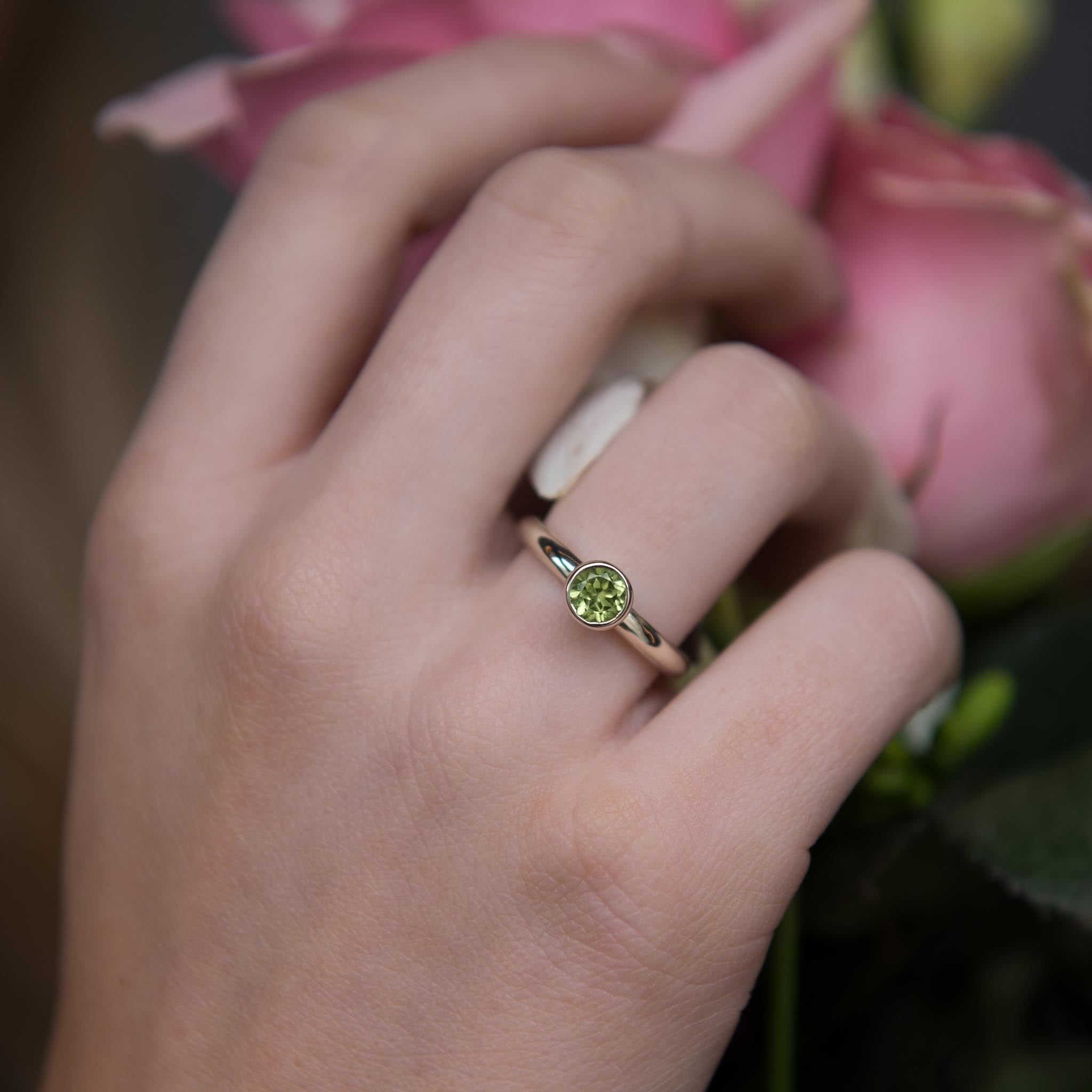 Peridot, Gold solitaire ring, Elegant design, Unique gemstone, 2050x2050 HD Phone