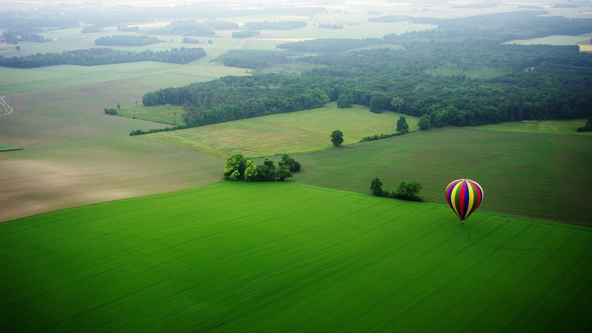 striped hot air balloon, green agricultural fields, aerial countryside landscape, Full HD Desktop wallpaper