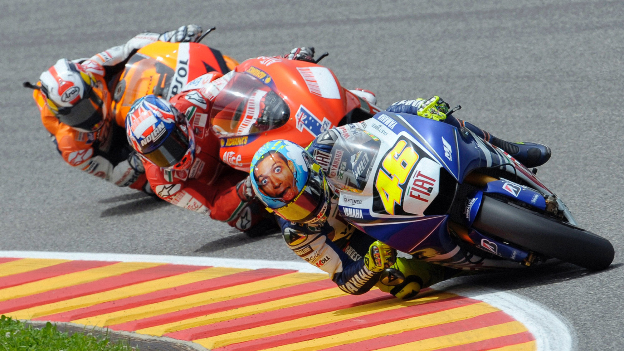 Valentino Rossi number 46, Casey Stoner red Ducati, Fiat Yamaha YZR-M1, Repsol Honda rider chasing, MotoGP three-bike train, HD Desktop wallpaper