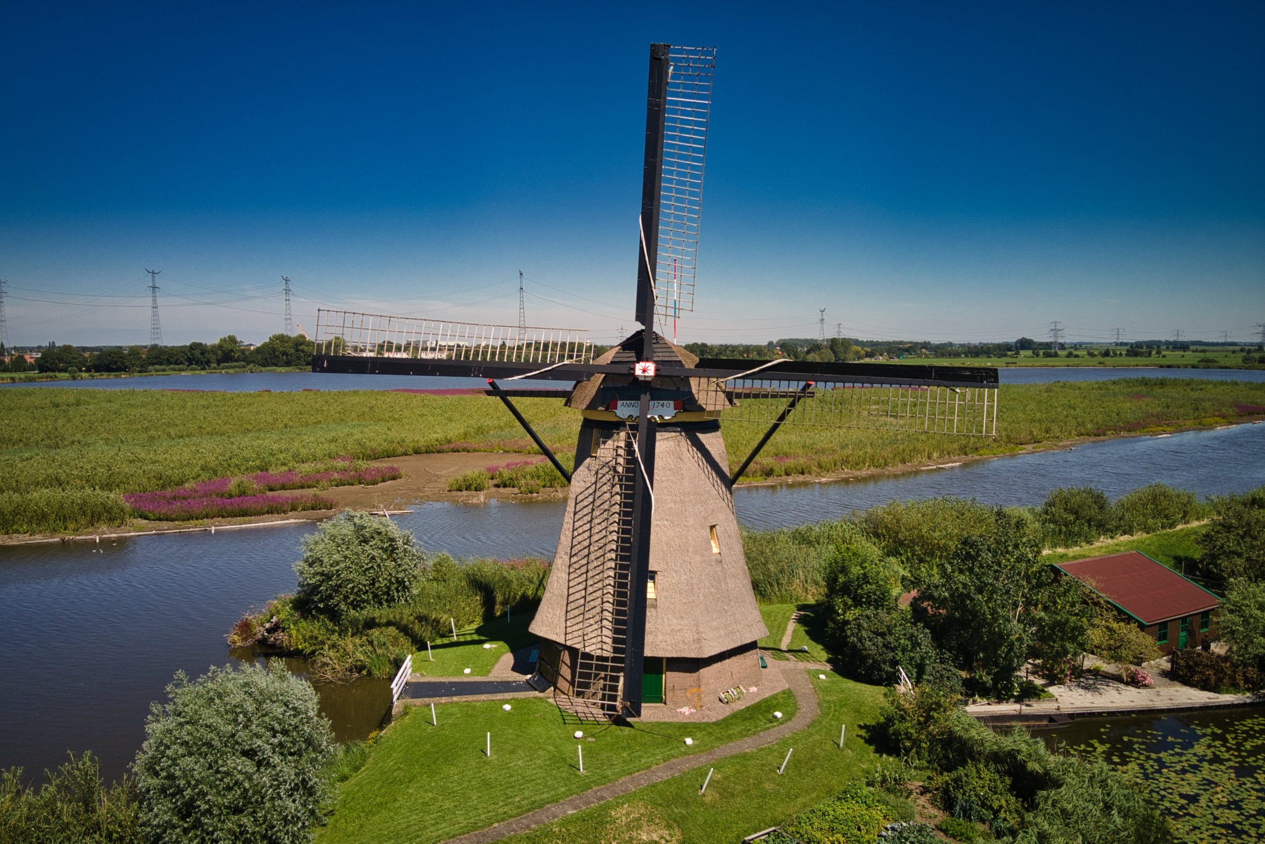 Windmills at Kinderdijk, Dutch heritage, Iconic landmarks, Picturesque countryside, 2560x1710 HD Desktop