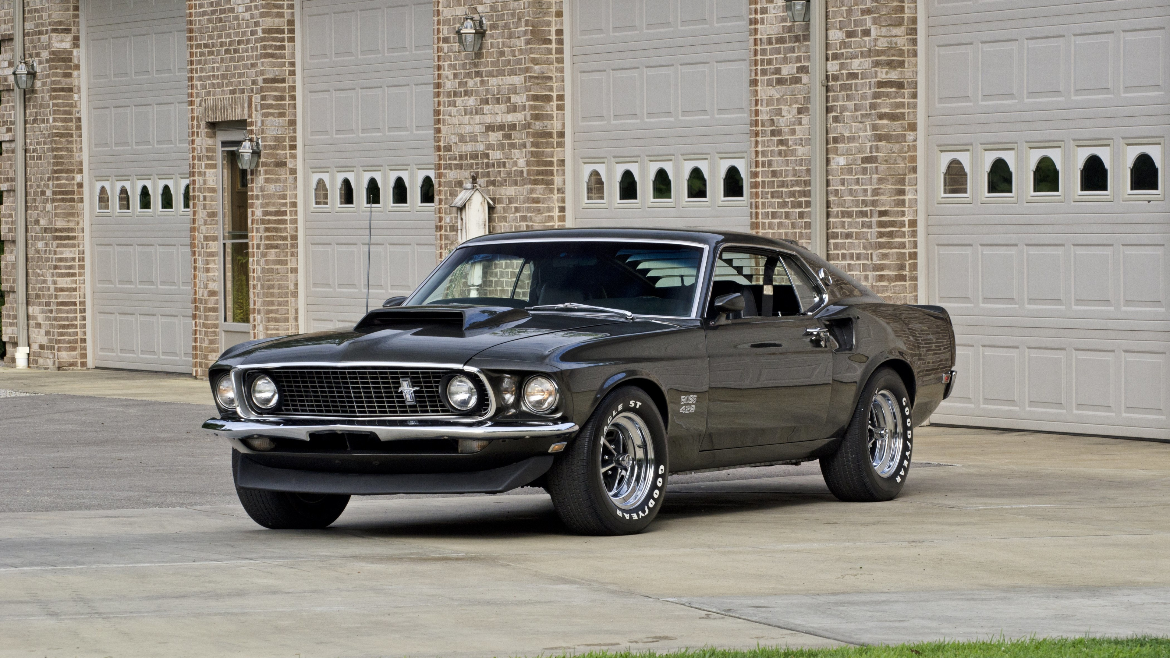 1969 Ford Mustang Boss 429, Goodyear Eagle tires, Brick garage driveway, 4K Desktop wallpaper
