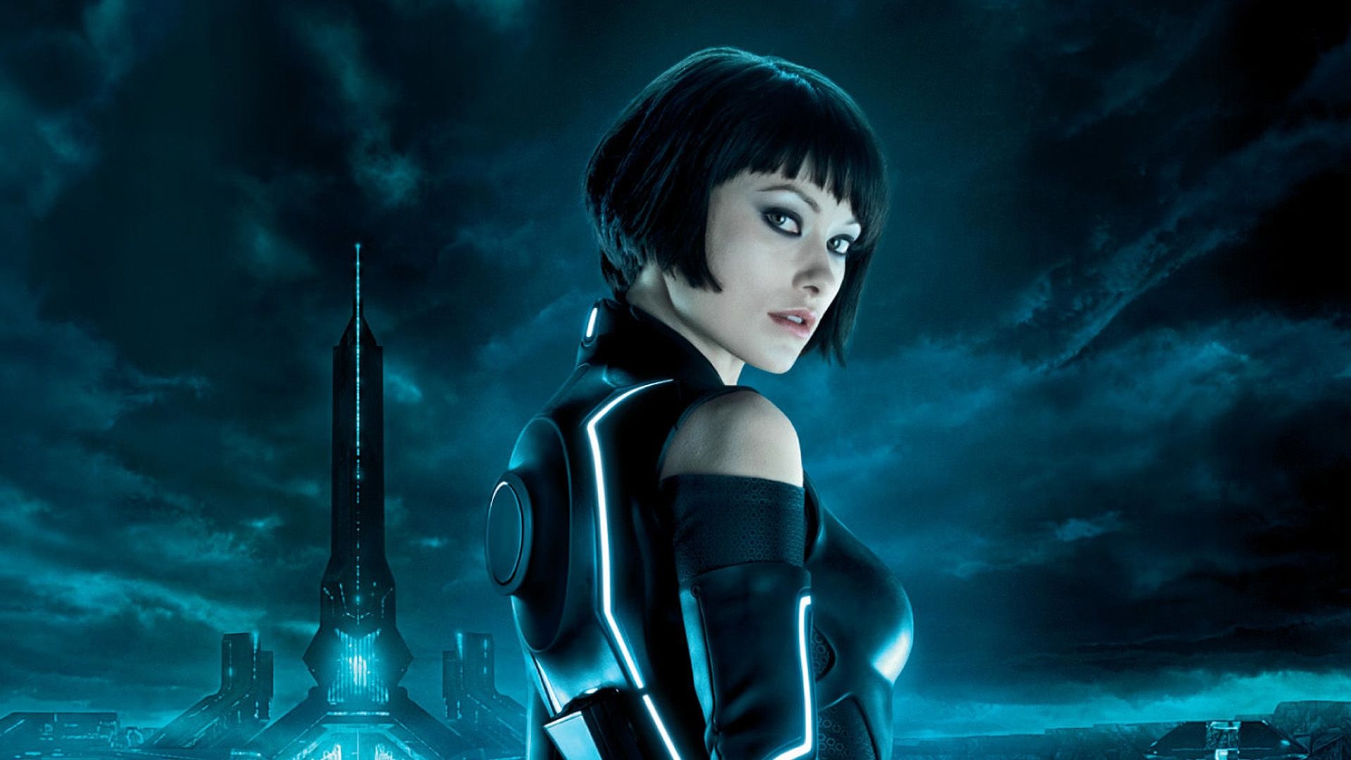 Olivia Wilde as Quorra, Tron: Legacy light suit, The Grid digital cityscape, Full HD Desktop wallpaper