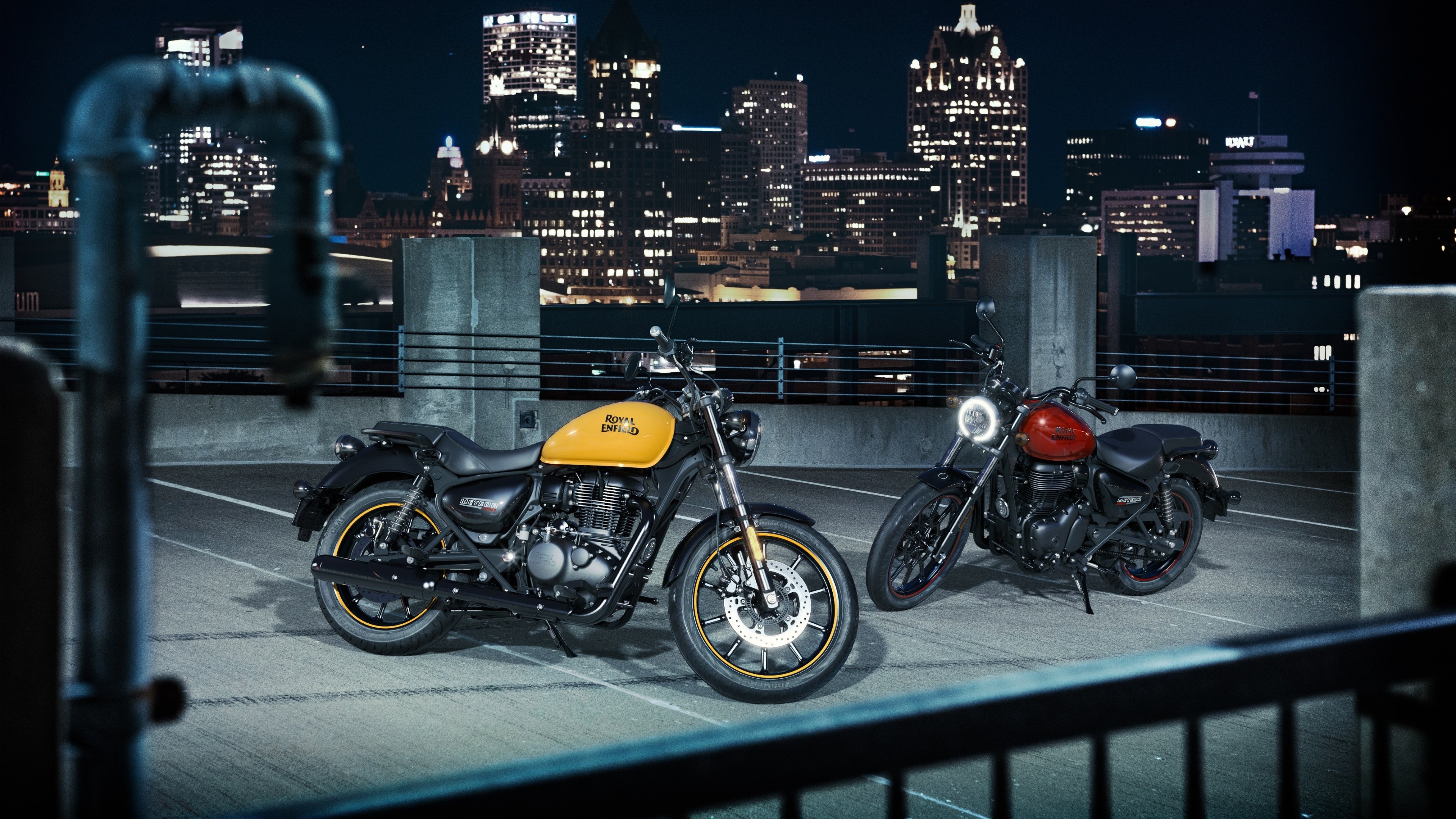 Royal Enfield Meteor 350, rooftop parking deck, night city skyline, 4K Desktop wallpaper