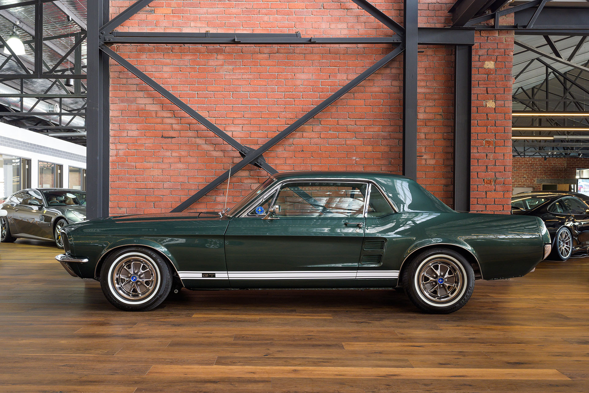 1967 Ford Mustang GT Hardtop, Exposed brick showroom, Polished hardwood floor, HD Desktop wallpaper