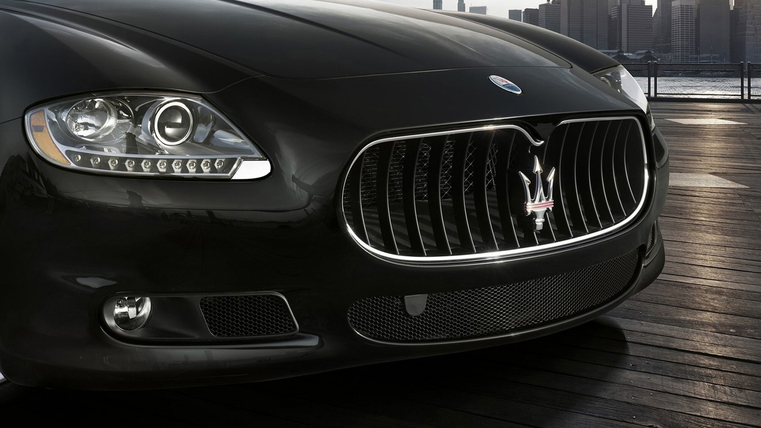 Maserati logo, Striking wallpaper, High-resolution background, Iconic symbol, 2560x1440 HD Desktop
