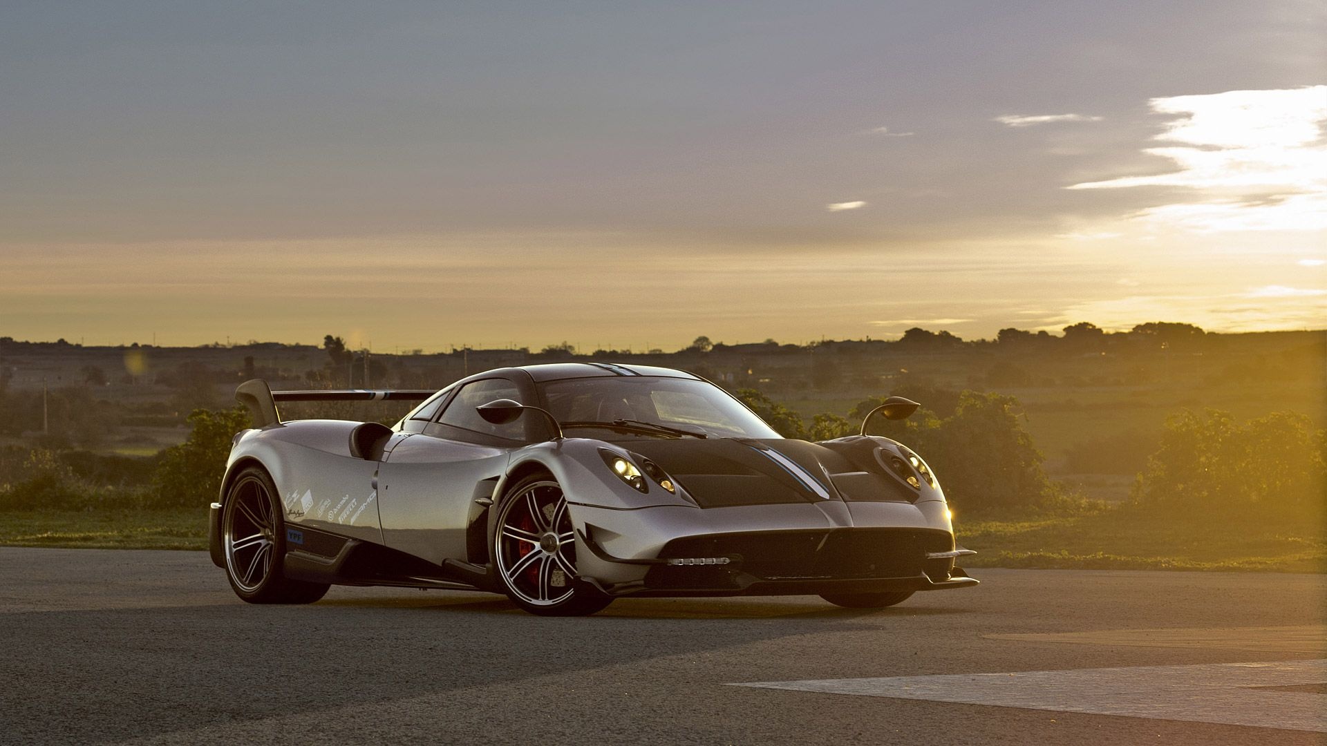 Pagani Huayra BC, golden hour sunset, asphalt tarmac, Full HD Desktop wallpaper
