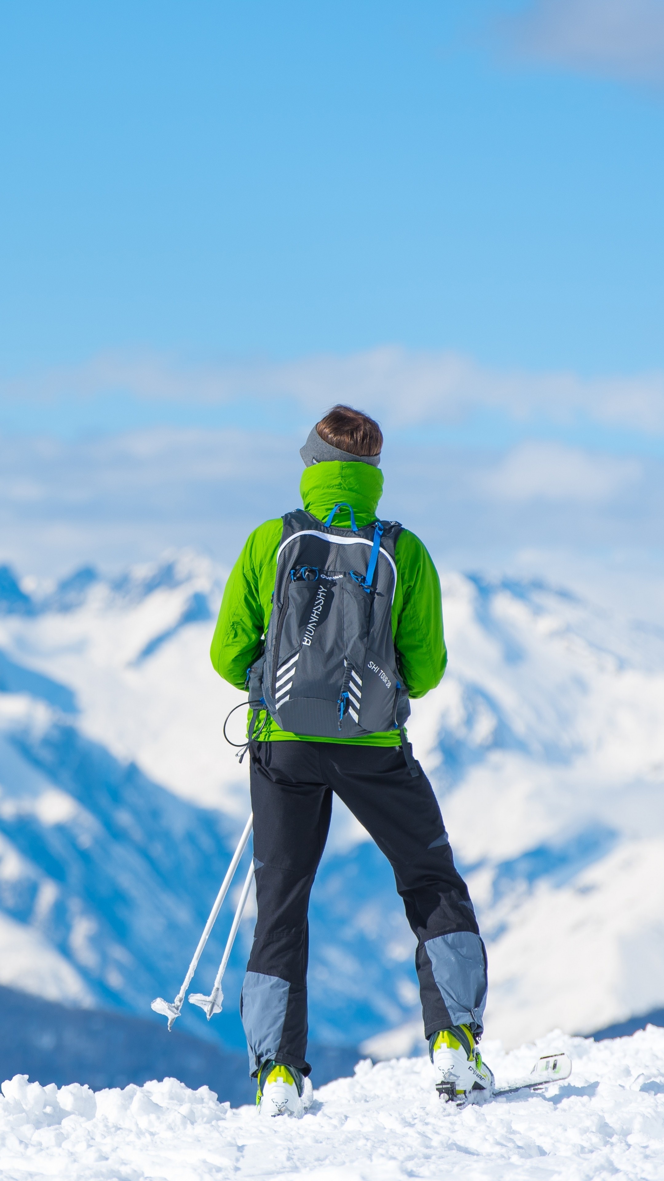 Sportsman skiing, Mountain top view, Tourist adventure, Thrilling experience, 2160x3840 4K Phone