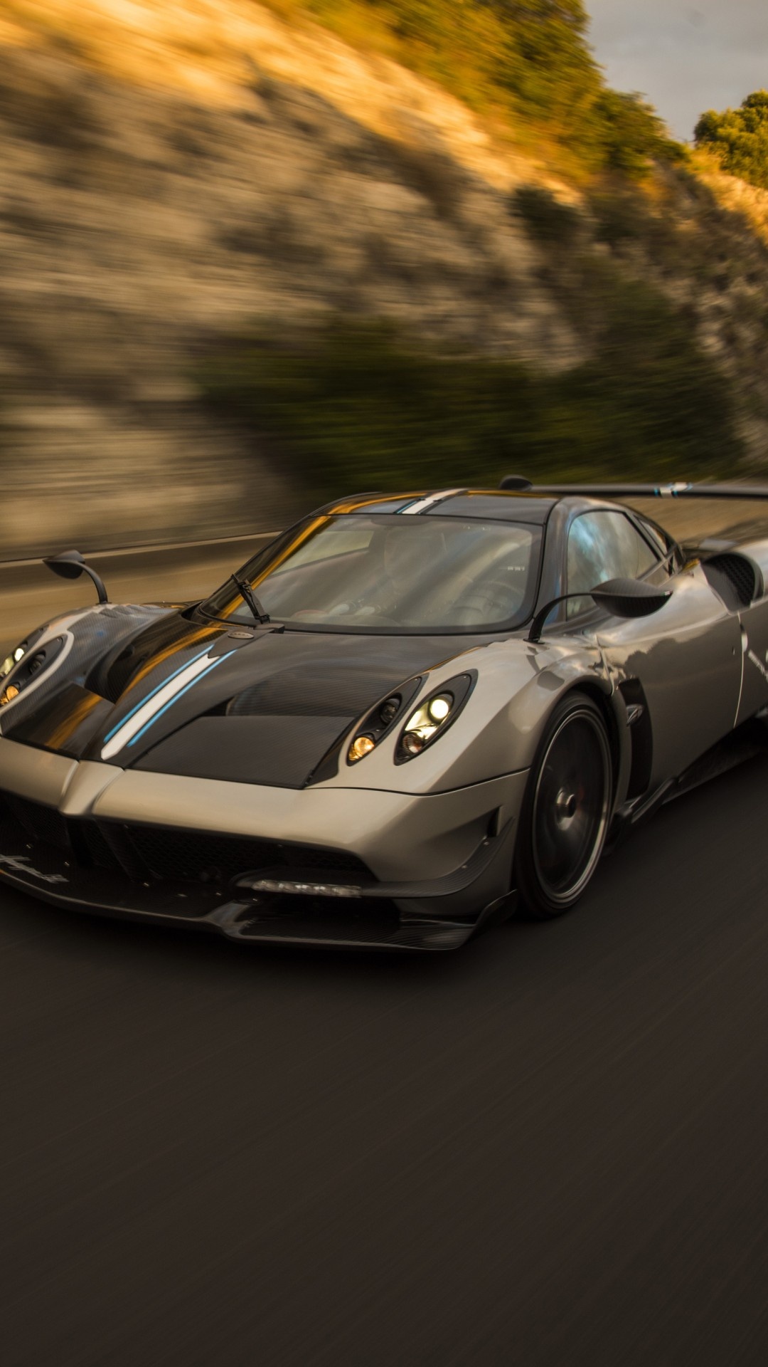 Pagani Huayra BC, Motion blur mountain road, Golden hour sunlight, Full HD Phone wallpaper