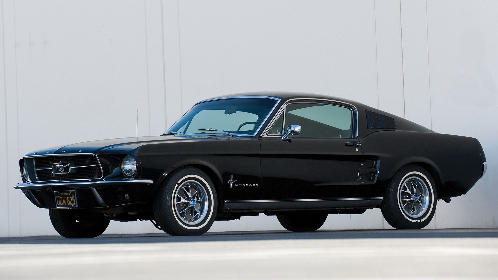 1967 Ford Mustang Fastback, Chrome styled steel wheels, Minimalist white wall backdrop, Full HD Desktop wallpaper
