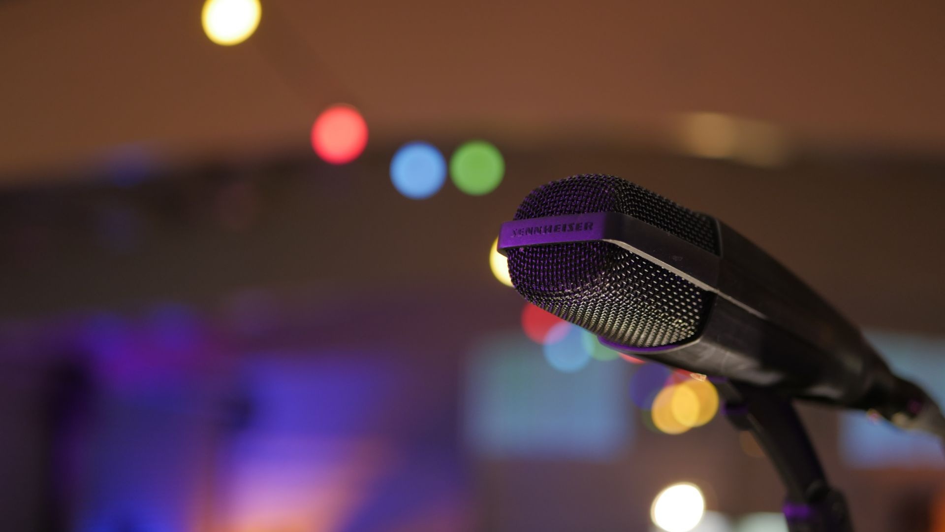 Black microphone close-up, Bokeh effect background, HD image clarity, Captivating visual, 1920x1080 Full HD Desktop