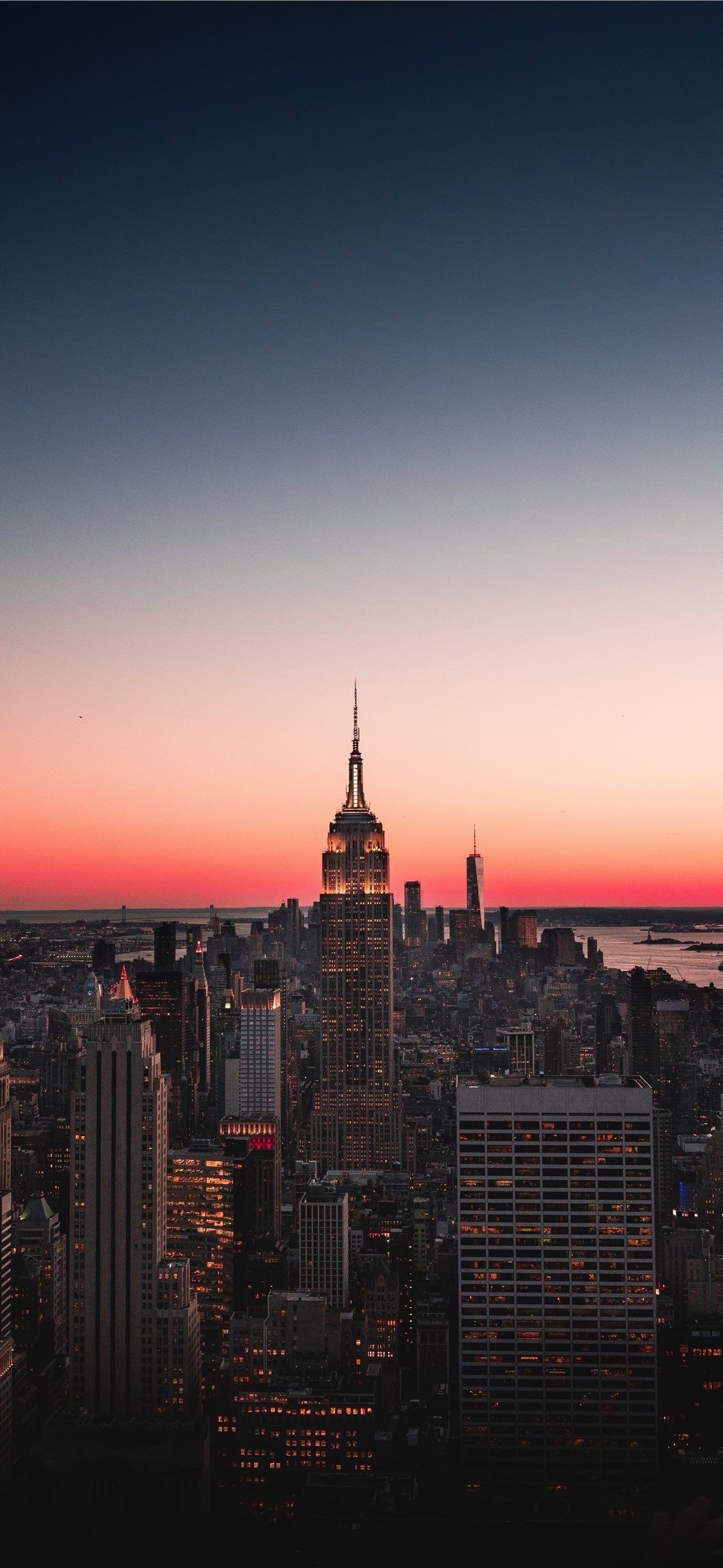 City skyline iPhone wallpapers, Phone screen cityscape, Urban wallpapers, Nighttime city lights, 1130x2440 HD Phone