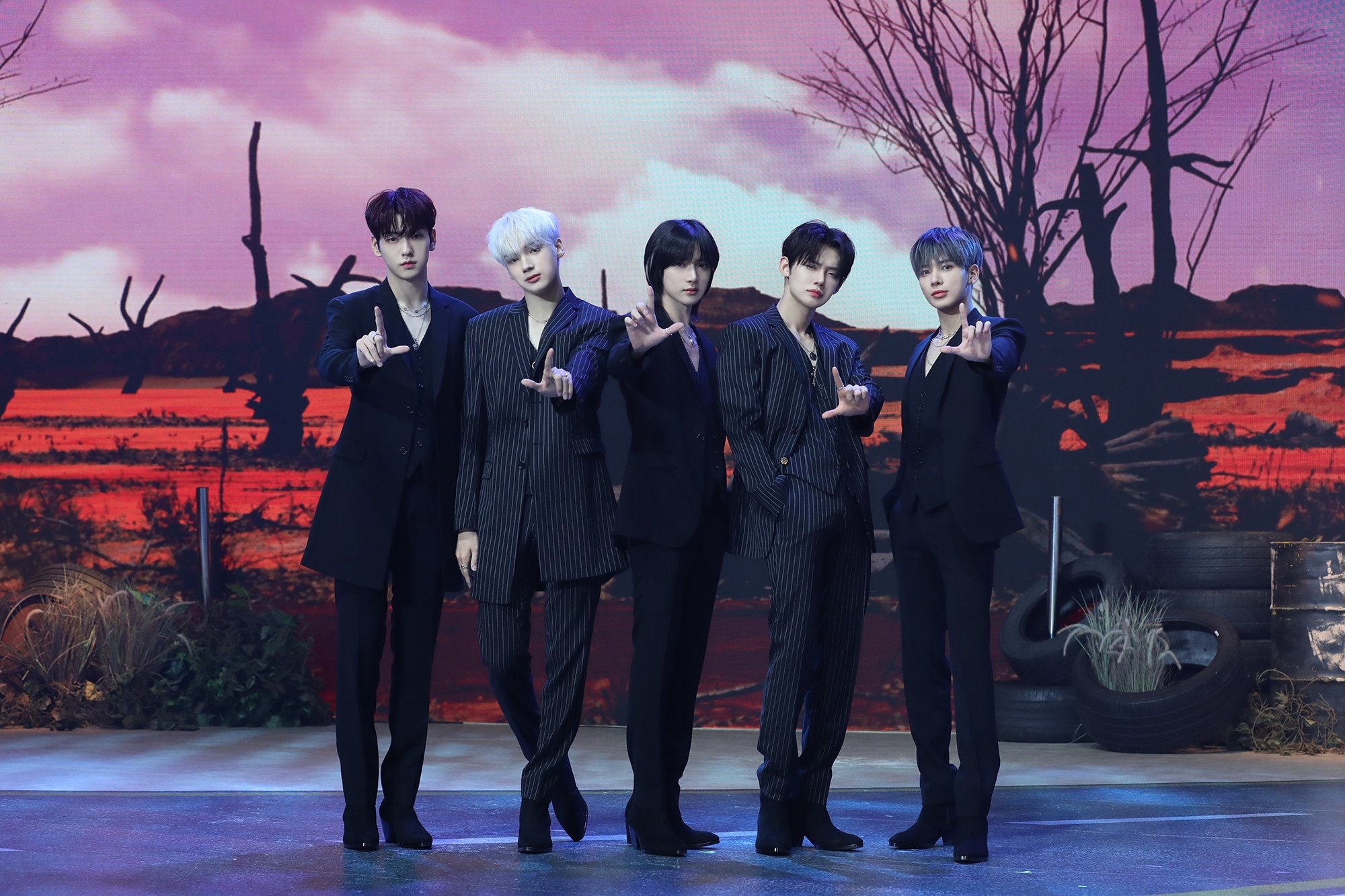 Tomorrow X Together, Black pinstripe suits, Apocalyptic desert stage backdrop, HD Desktop wallpaper