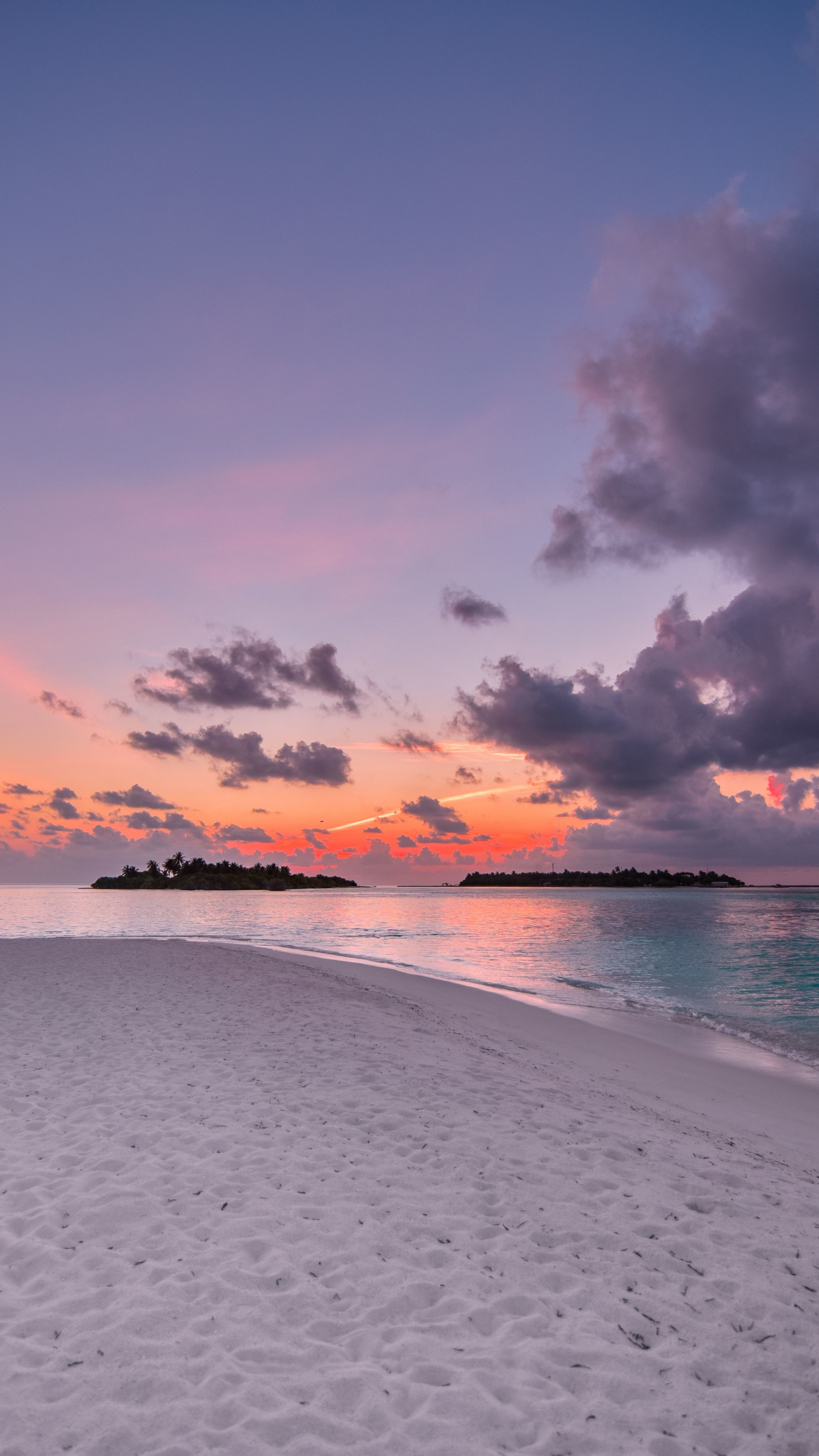 tropical island silhouette, white sand beach, pink dusk clouds, 4K Phone wallpaper