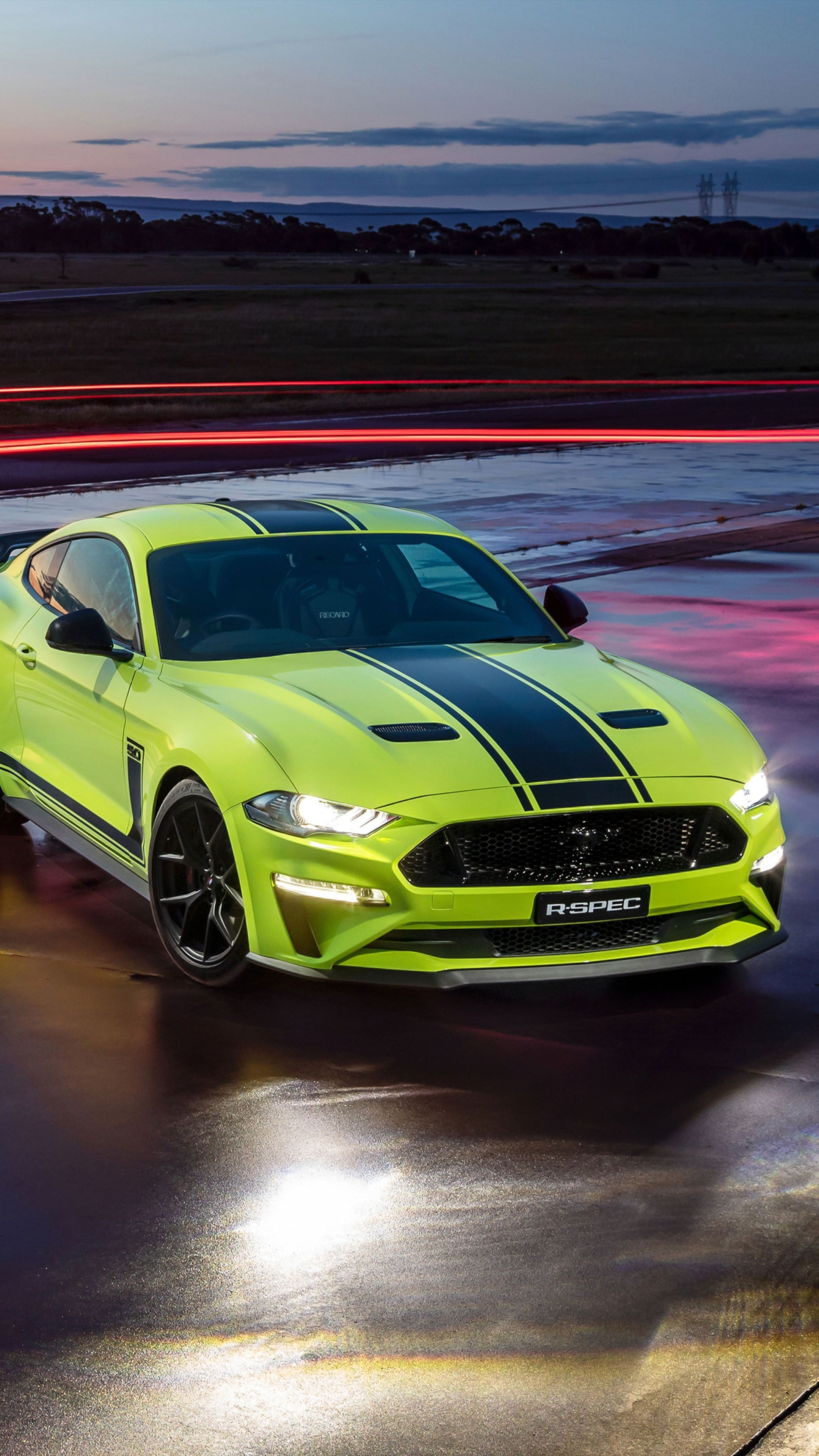 Ford Mustang R-Spec, Grabber Lime paint finish, Wet racetrack at dusk, 4K Phone wallpaper