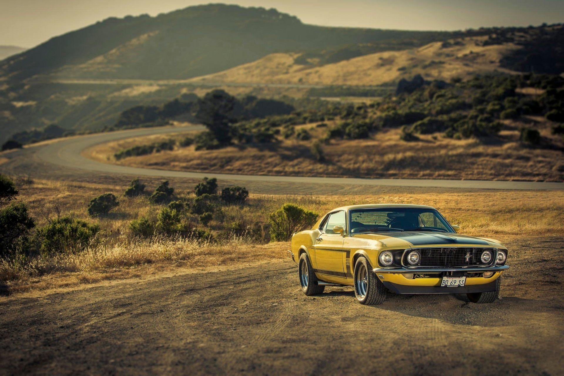 1969 Ford Mustang Boss 302, Winding hillside road, Arid rolling hills landscape, HD Desktop wallpaper