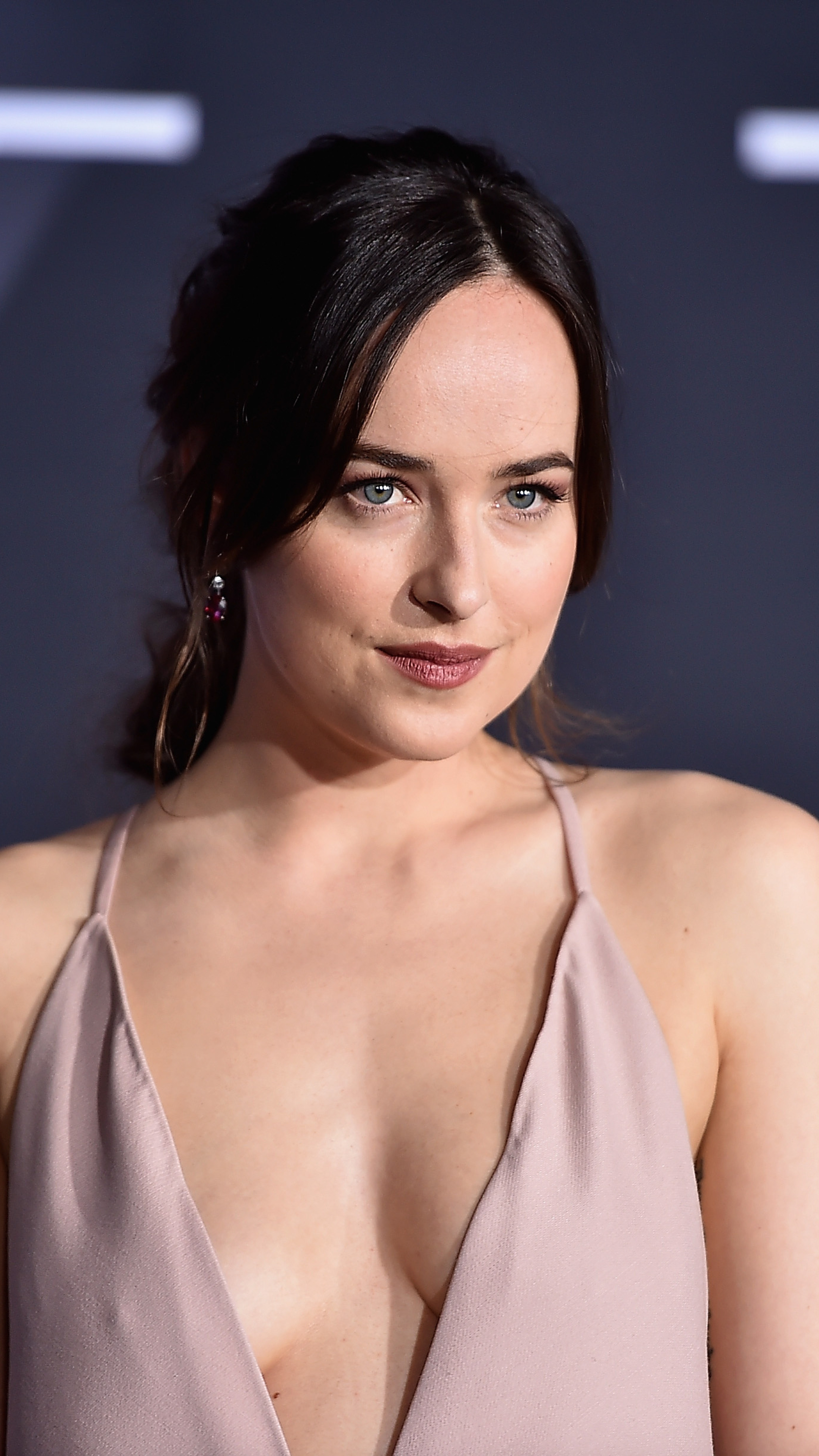 Dakota Johnson, Mesmeric gaze, Enchanting elegance, Photogenic charm, 2160x3840 4K Phone