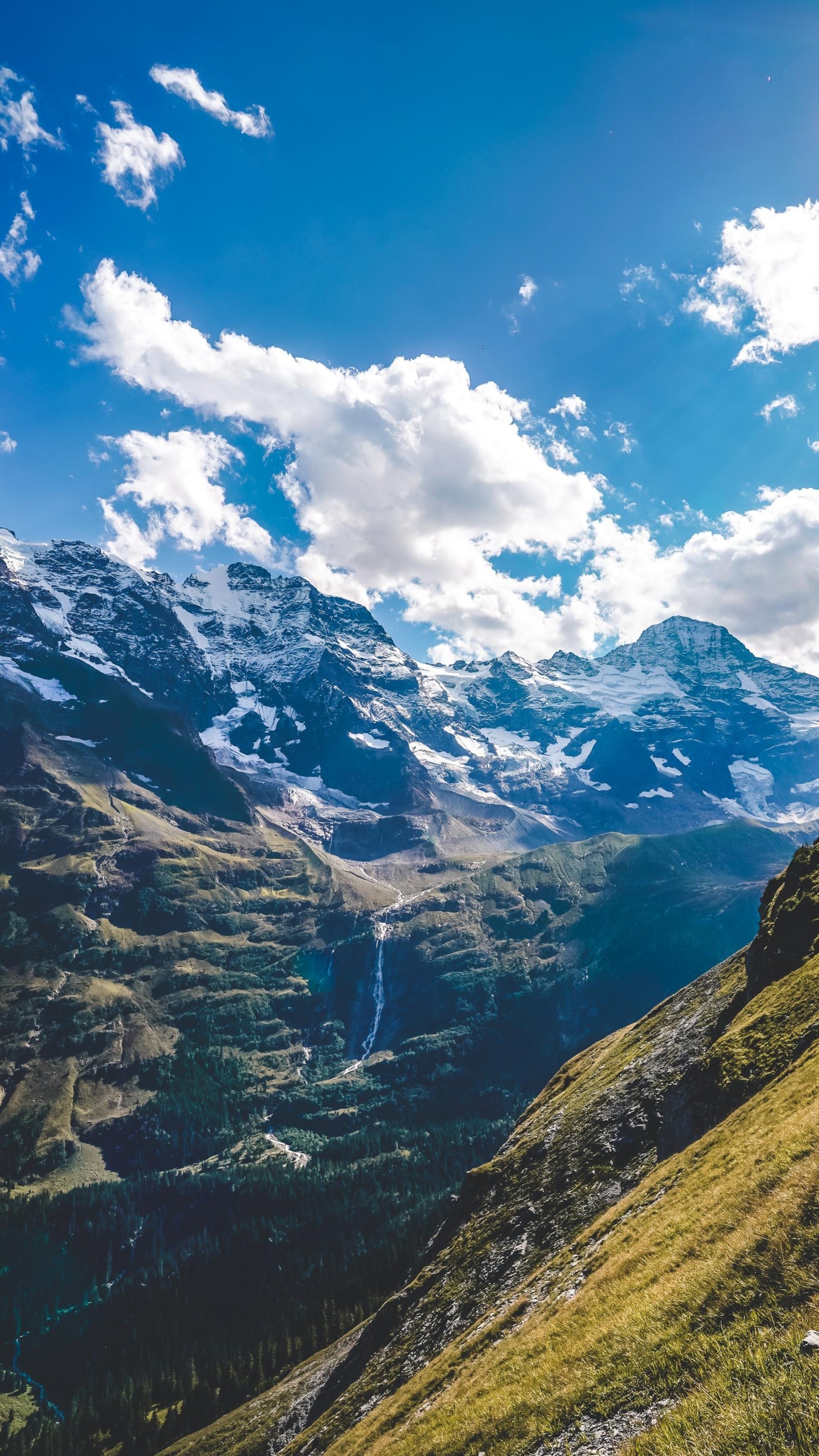 Swiss Alps mountain range, Glacial alpine waterfall, Grassy mountain slope, 4K Phone wallpaper