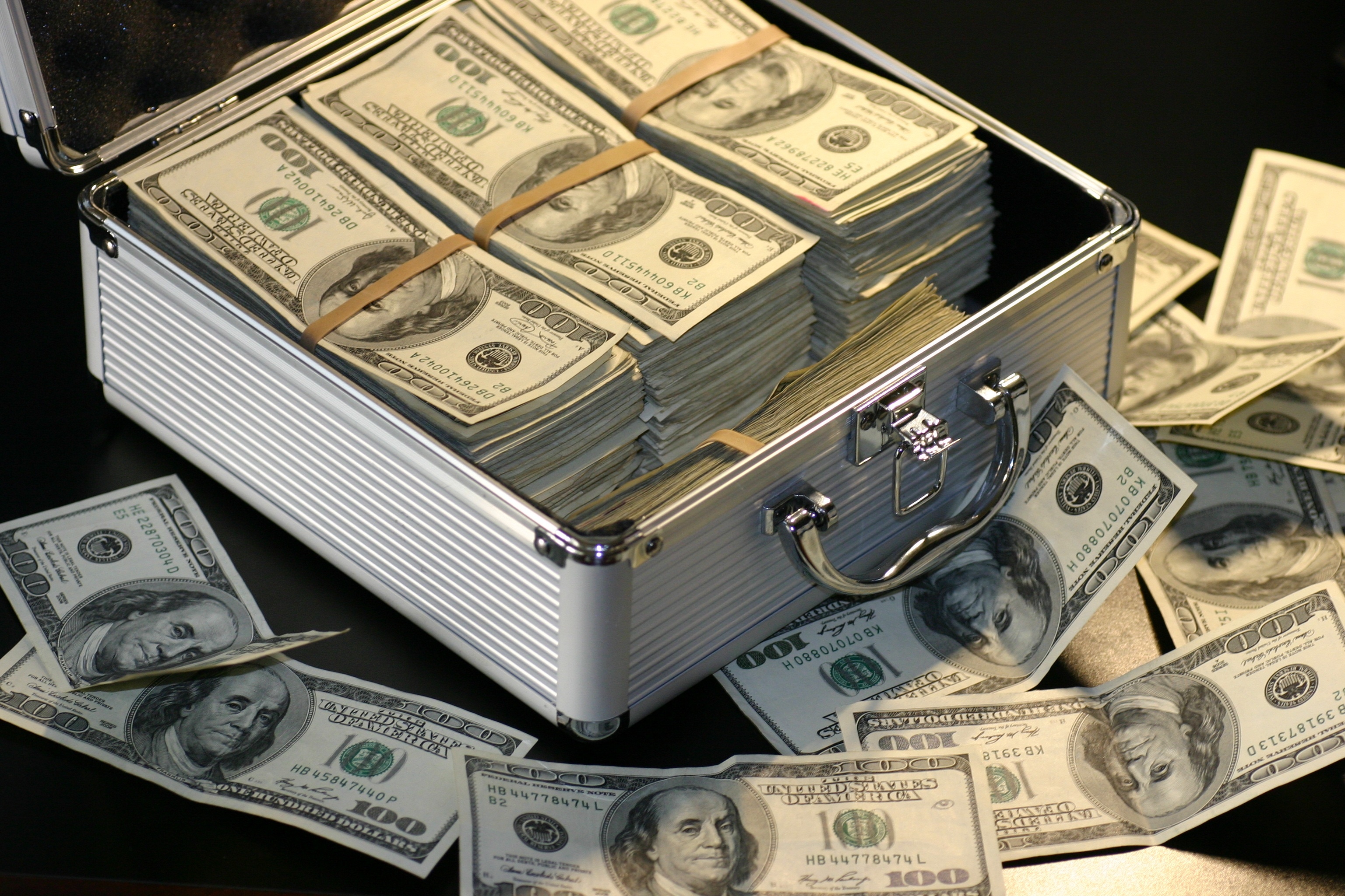 Benjamin Franklin hundred-dollar bills, Open aluminum briefcase, Rubber-banded cash stacks, HD Desktop wallpaper