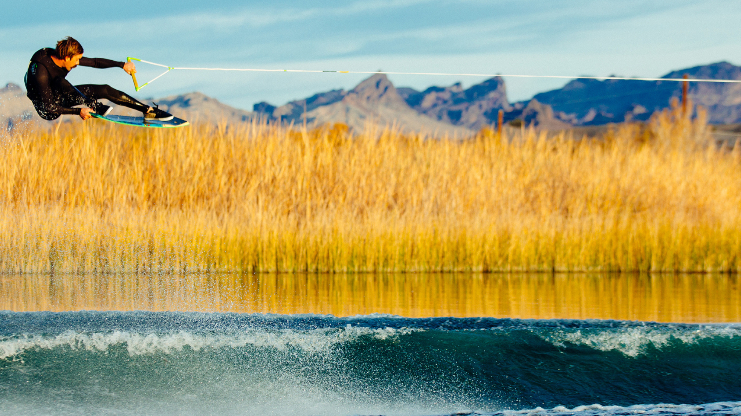 Tail grab, Wakeboarding Wallpaper, 2560x1440 HD Desktop