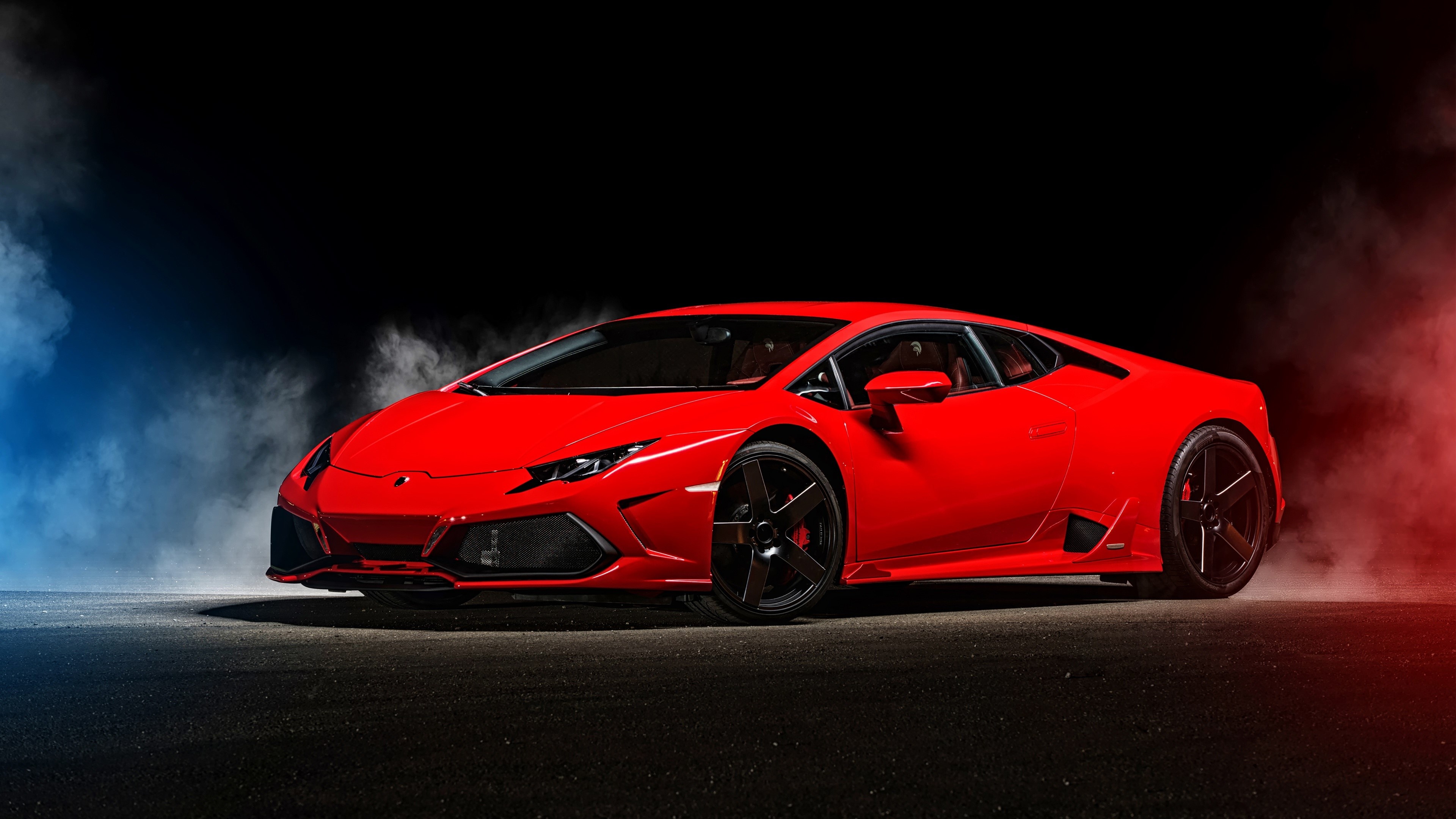 Lamborghini HuracÃ¡n, black alloy wheels, blue and red smoke, 4K Desktop wallpaper