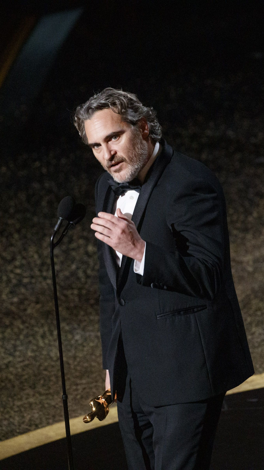 Joaquin Phoenix, Desktop wallpaper, Scoundrel character, Oscars recognition, 1080x1920 Full HD Phone