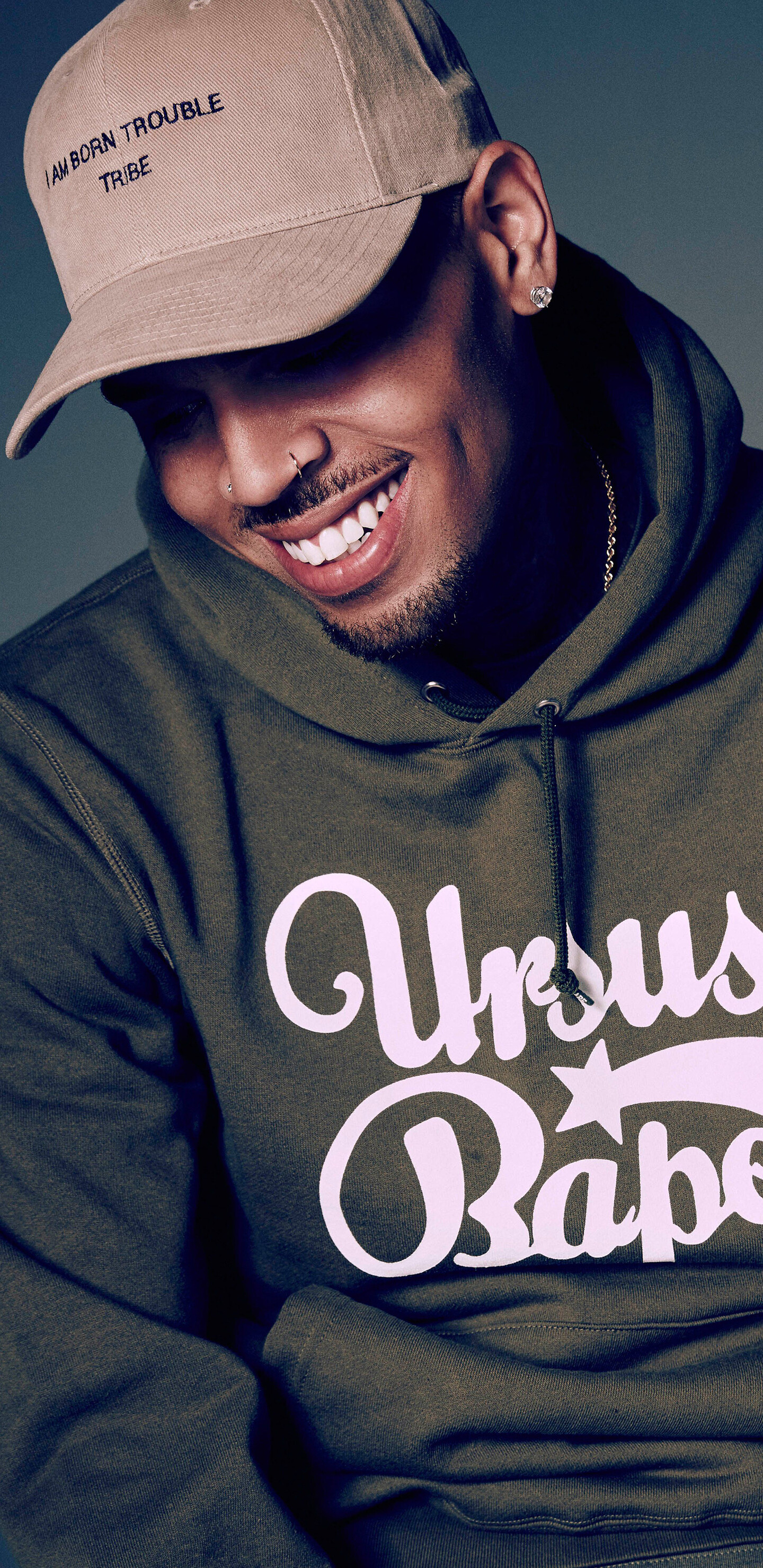 Chris Brown's creativity, Striking wallpaper, Mesmerizing visuals, Dynamic energy, 1440x2960 HD Phone