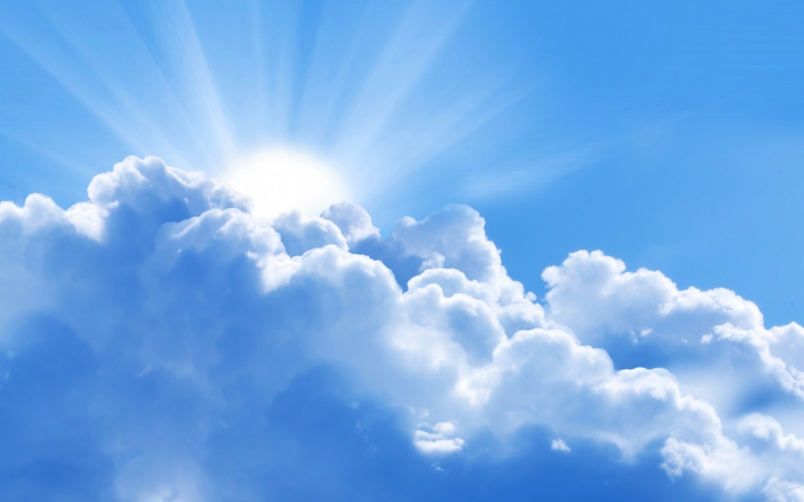 radiant sunburst with sunbeams, fluffy white cumulus clouds, clear blue daytime sky, HD Desktop wallpaper