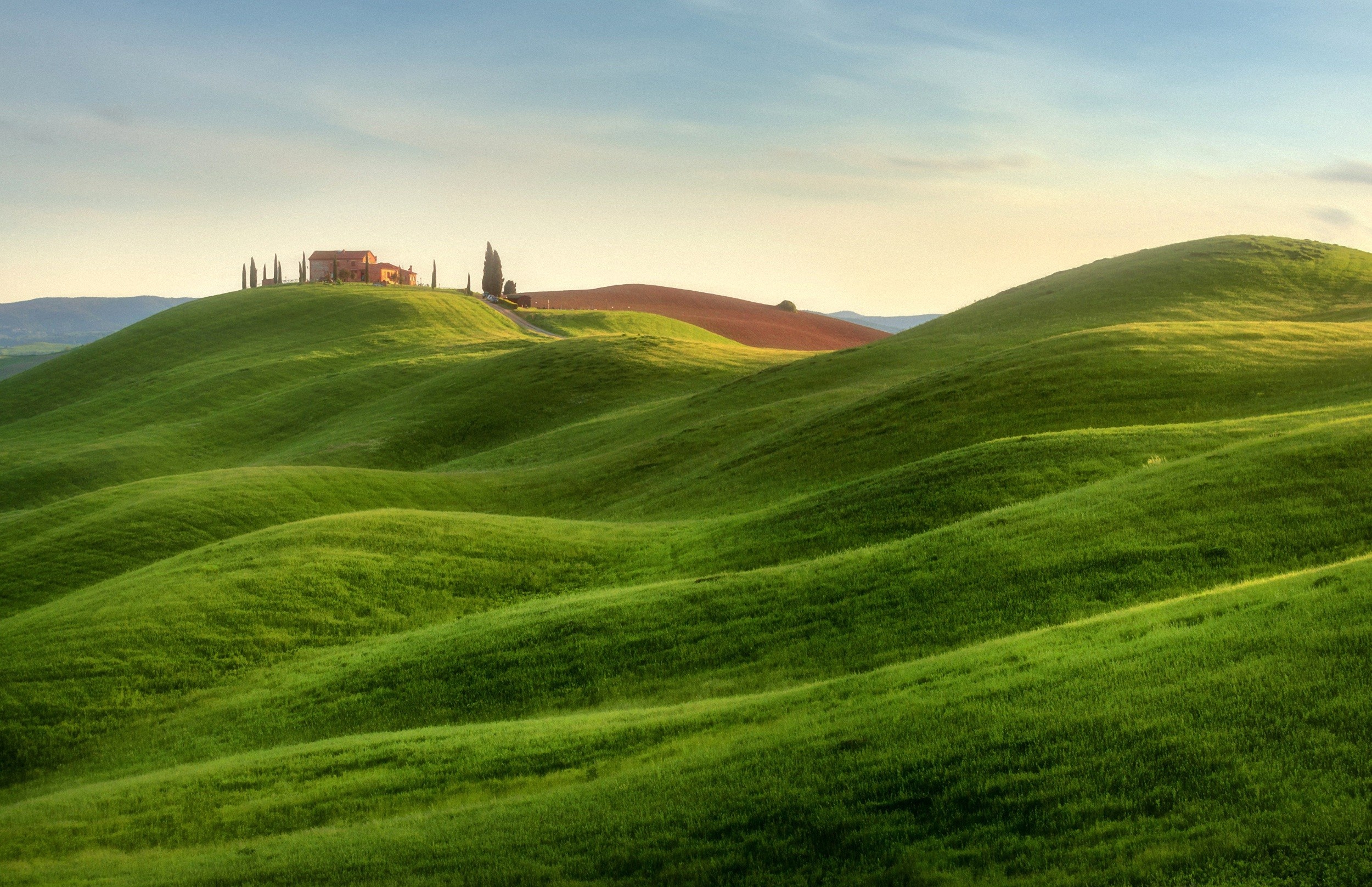 Grassy hill's charm, Green hills vista, Sky's backdrop, Desktop wallpaper, 2500x1620 HD Desktop