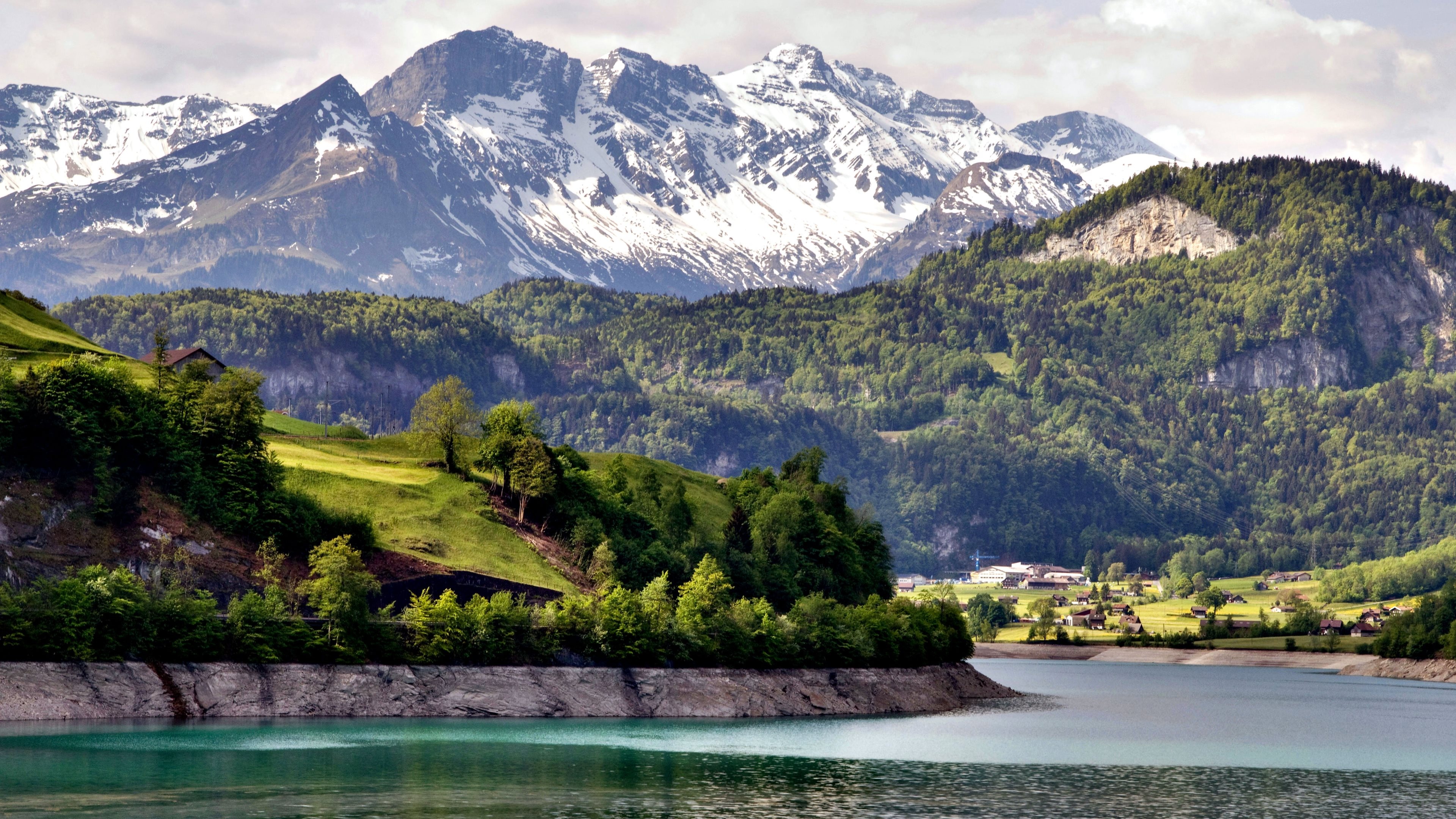 Swiss Alps mountain range, Turquoise alpine lake, Lush green mountain slopes, 4K Desktop wallpaper
