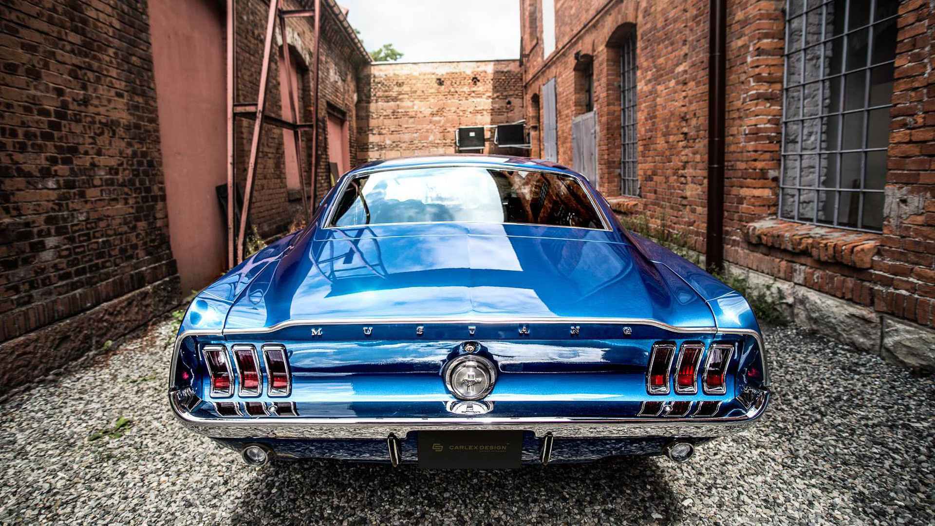 1967 Ford Mustang Fastback, Chrome rear bumper and taillights, Industrial red brick alleyway, Full HD Desktop wallpaper