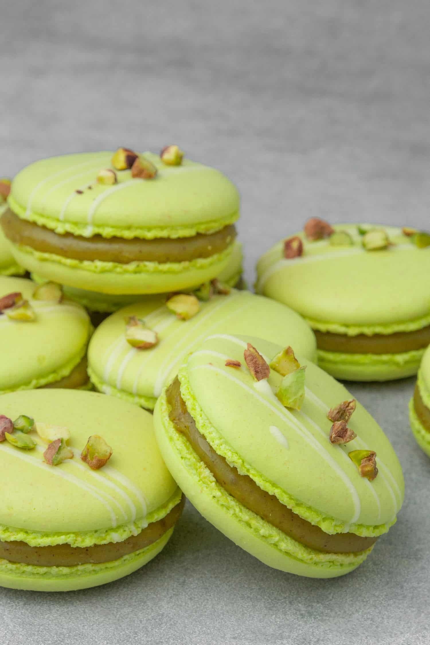 Pistachio macarons, Creamy ganache filling, Nutty and delicate, Patisserie-style delight, 1500x2250 HD Phone