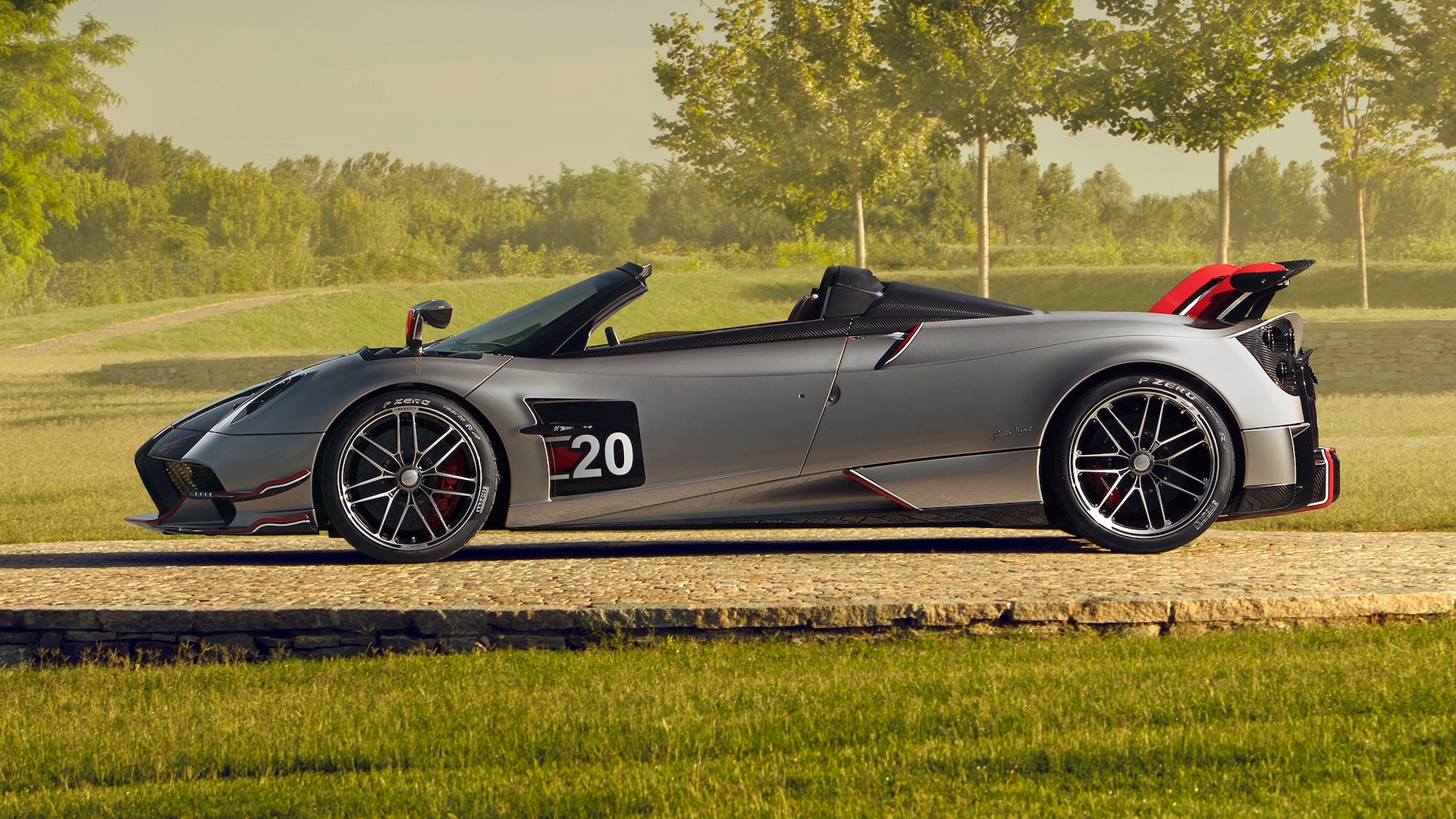 Pagani Huayra Roadster BC, Cobblestone driveway, Sunlit grassy lawn, Full HD Desktop wallpaper
