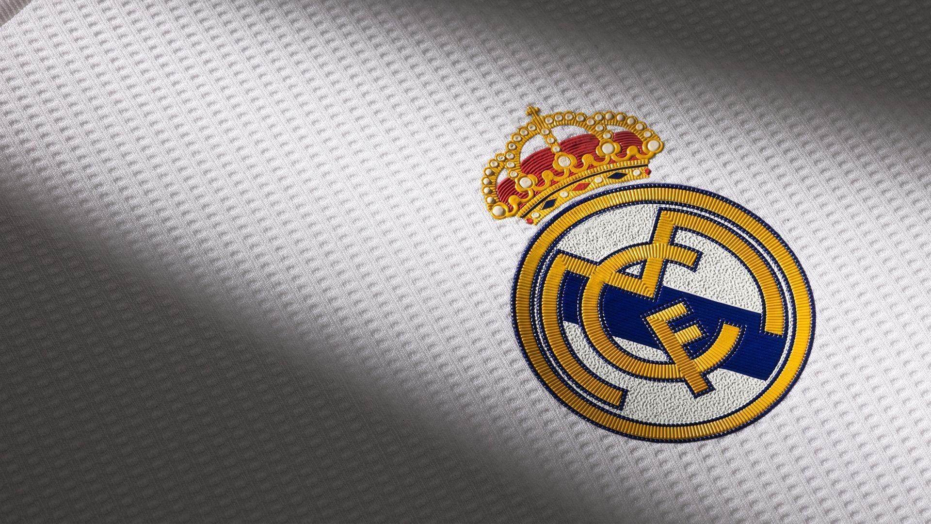 Real Madrid CF crest, textured football jersey fabric, embroidered gold crown, Full HD Desktop wallpaper