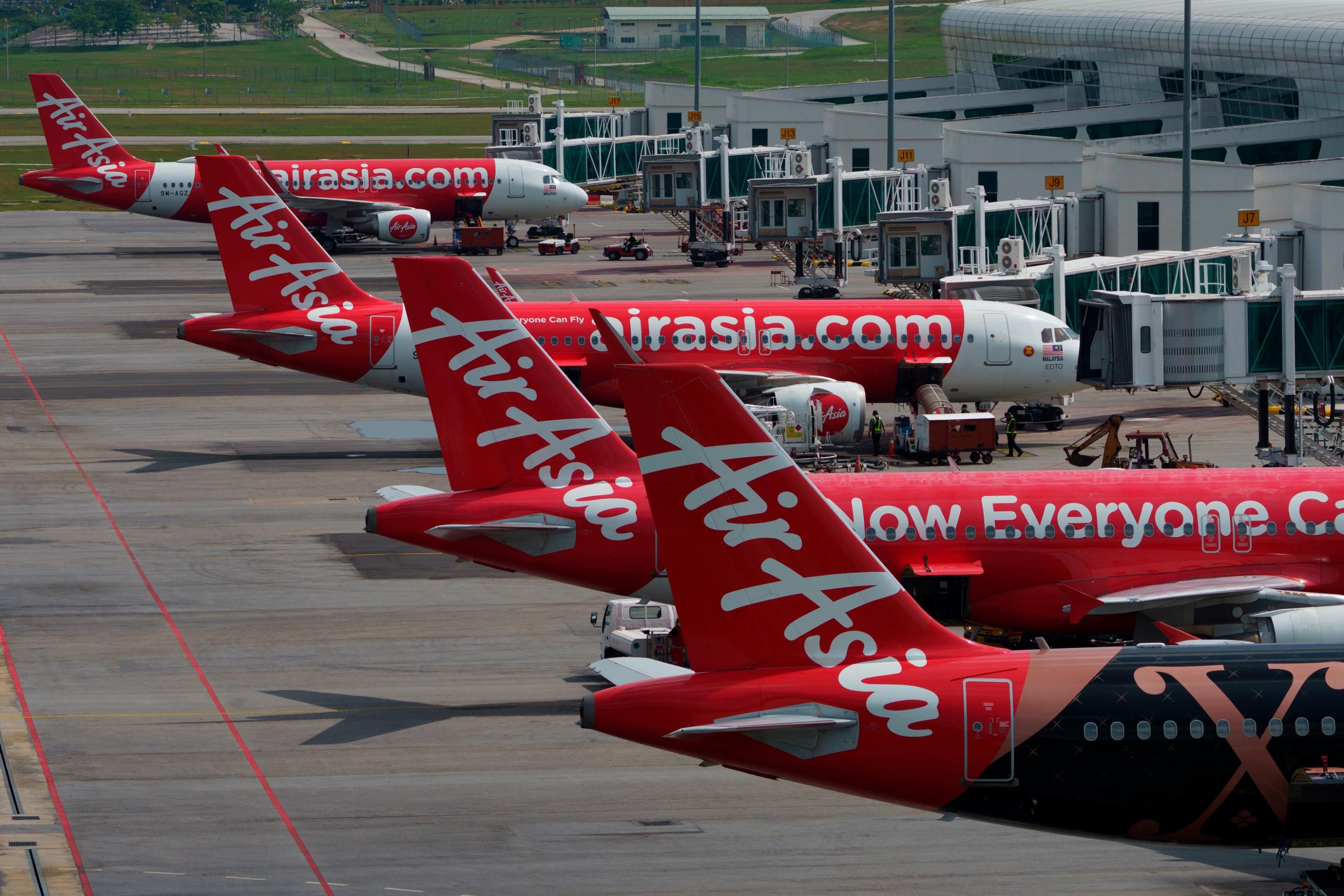 AirAsia flight incident, Malaysia travel news, On-board snake discovery, CNN report, 2930x1960 HD Desktop