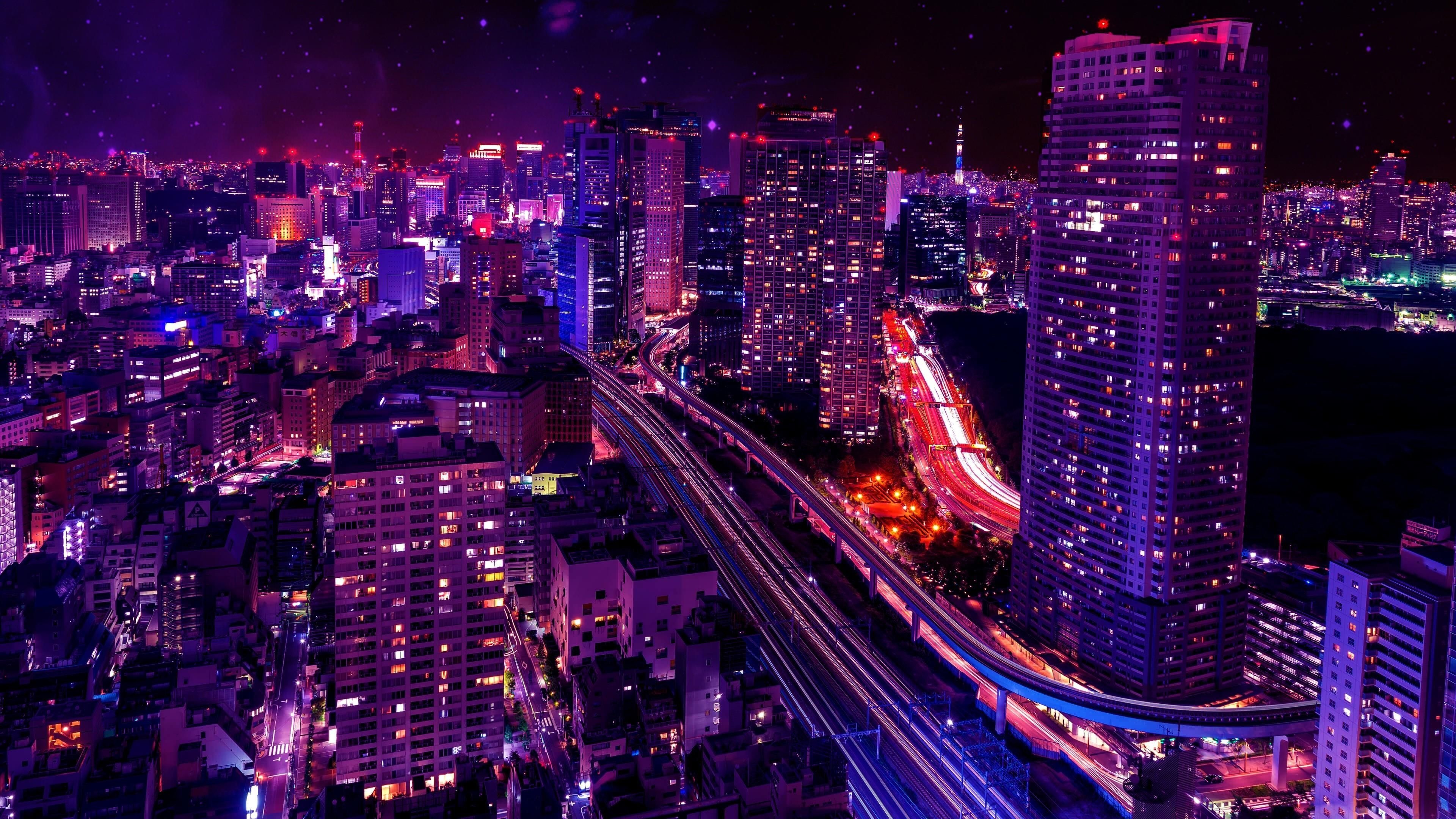 Tokyo night cityscape, elevated expressway light trails, purple synthwave night sky, 4K Desktop wallpaper