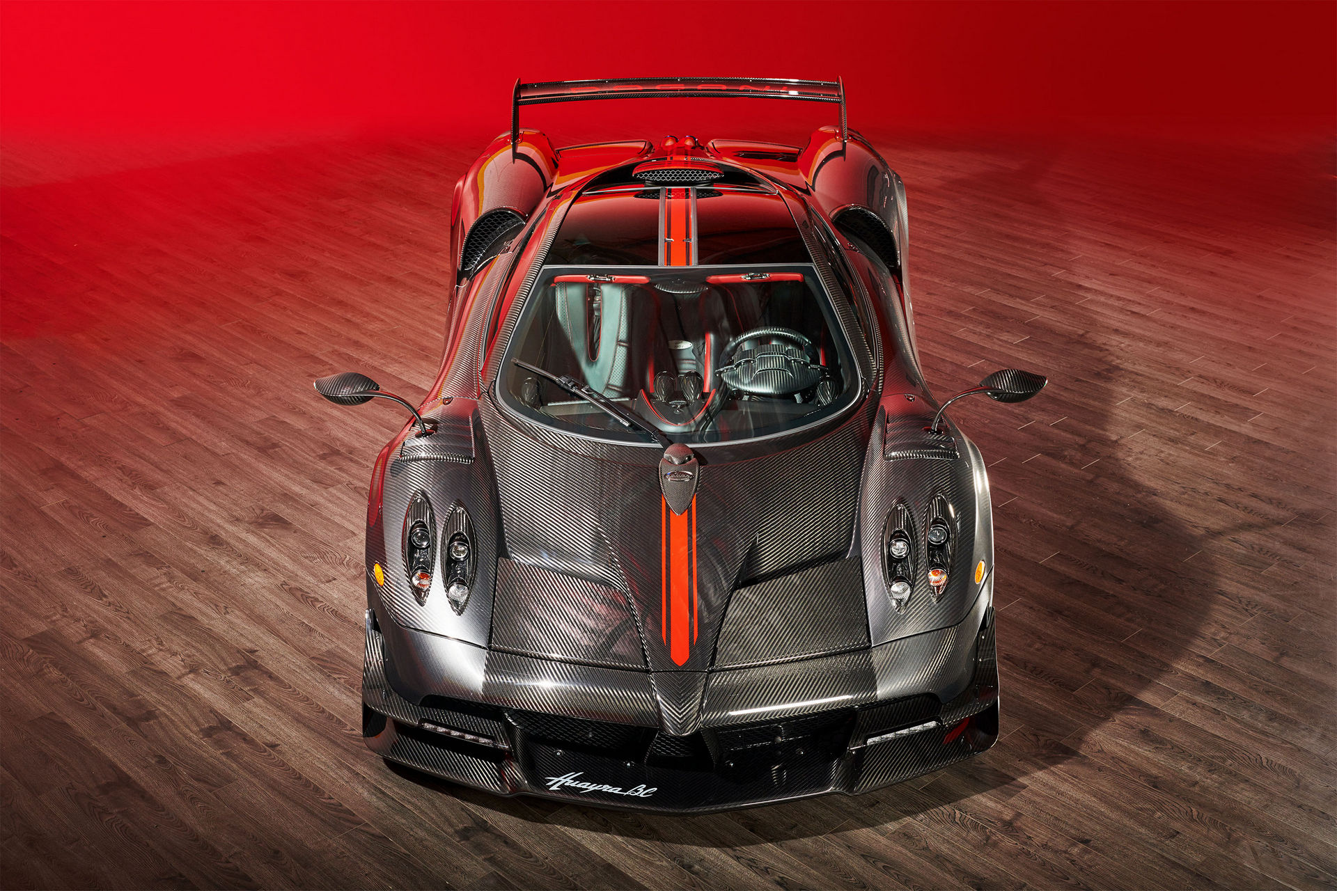 Pagani Huayra BC, Exposed carbon fiber body, Dark wood floor studio, HD Desktop wallpaper