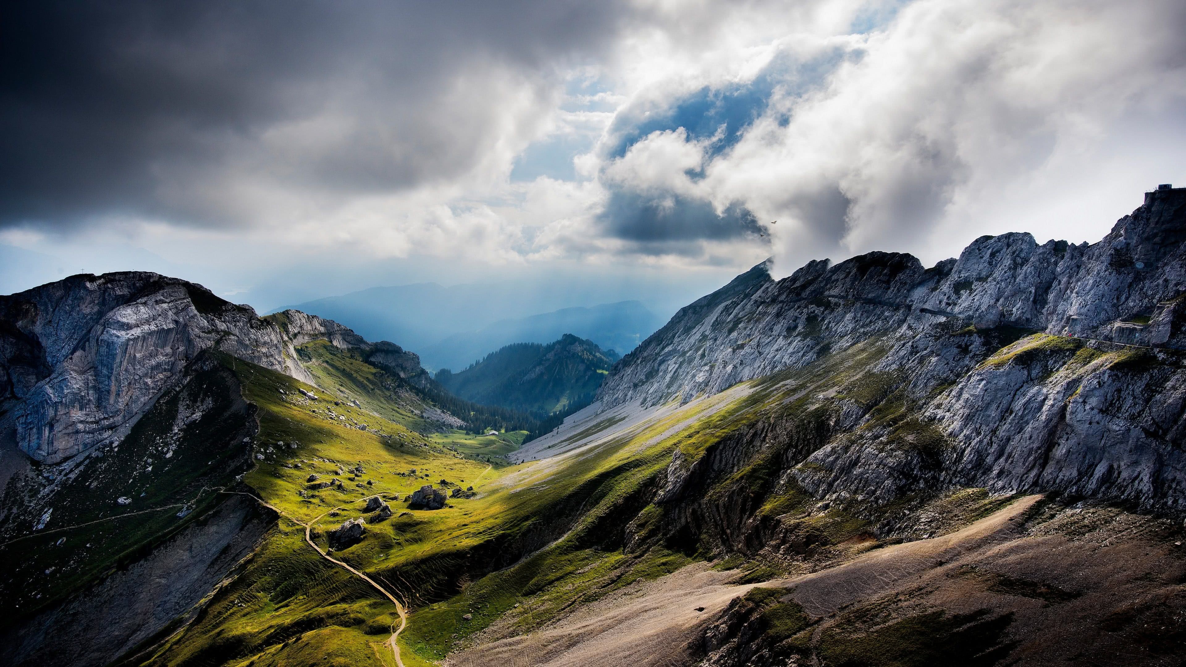 Mount Pilatus mountain ridge, Winding alpine hiking trail, Dramatic storm clouds, 4K Desktop wallpaper