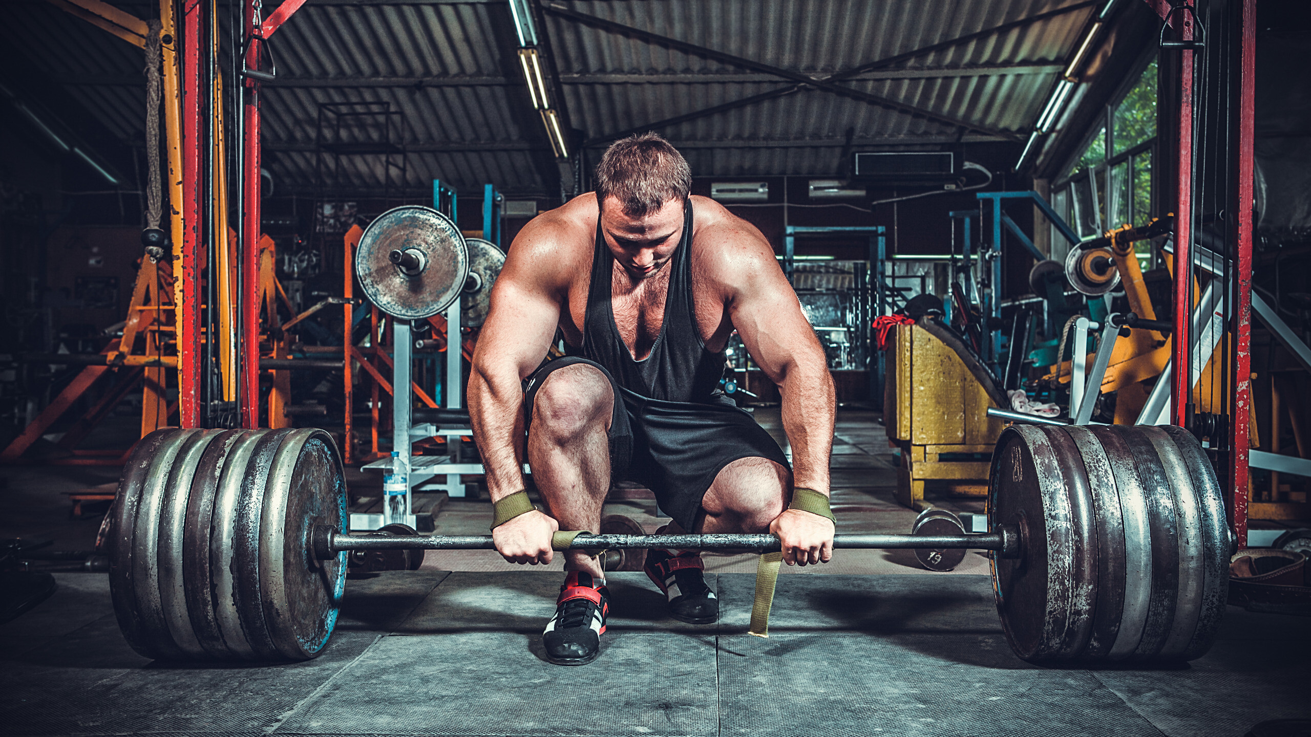 Powerlifting pose, Strength and determination, Fitness dedication, Extreme sports, 2560x1440 HD Desktop